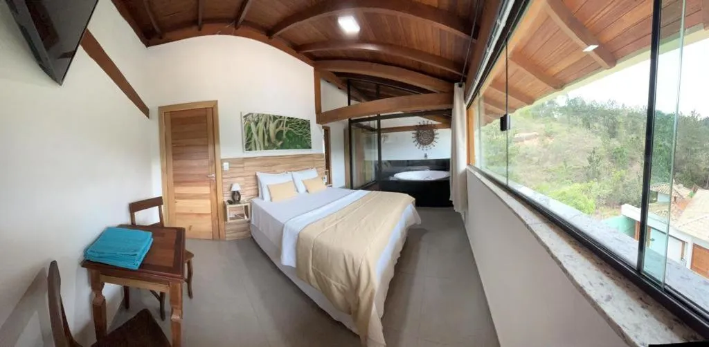 Bed in Pousada Mar Mineiro Macacos