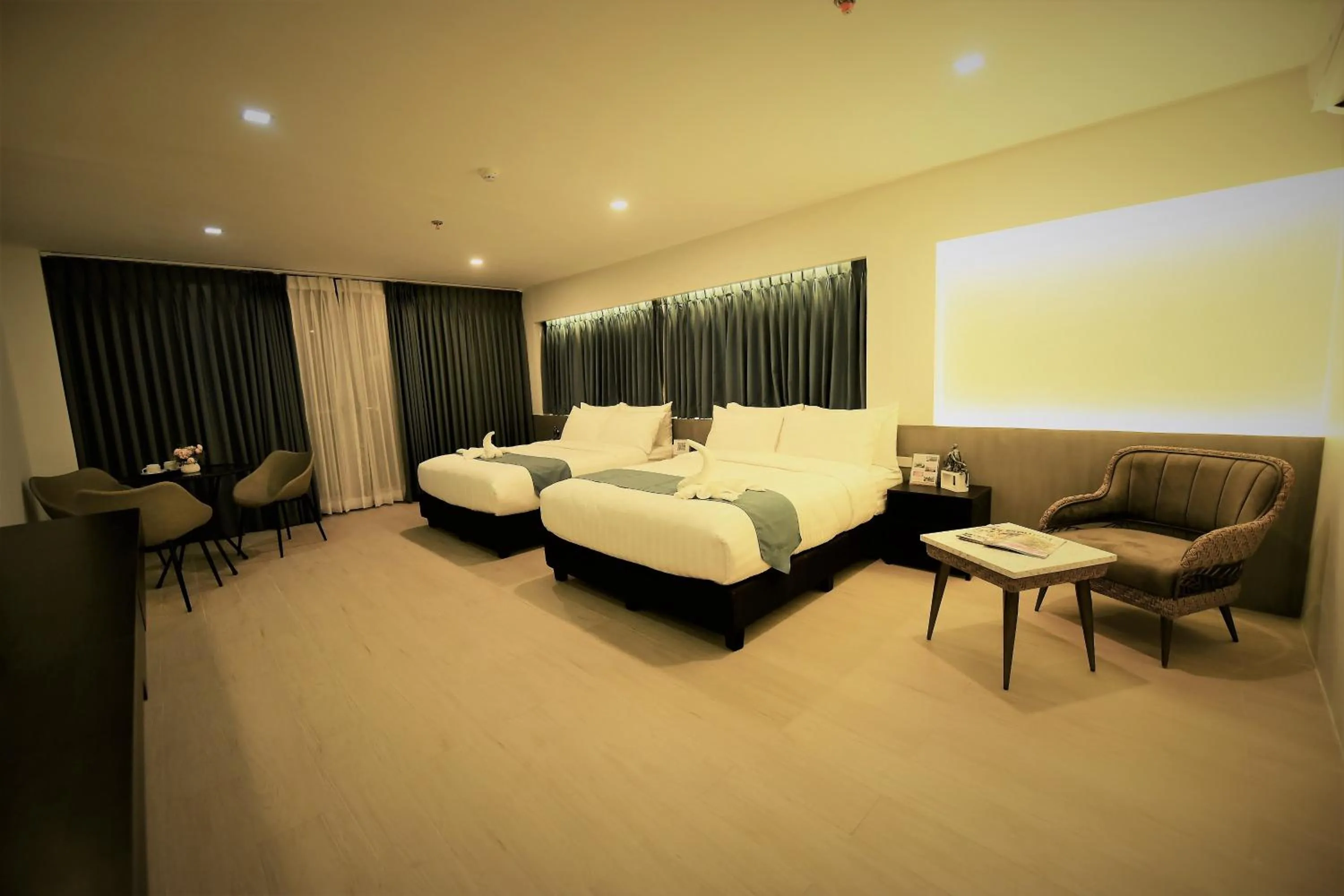 Photo of the whole room, Bed in The First Islatel