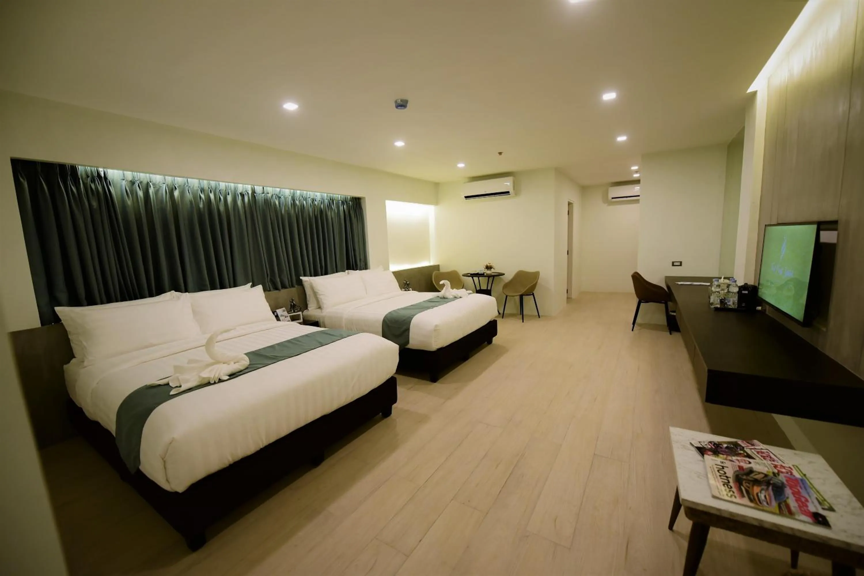 Photo of the whole room, Bed in The First Islatel