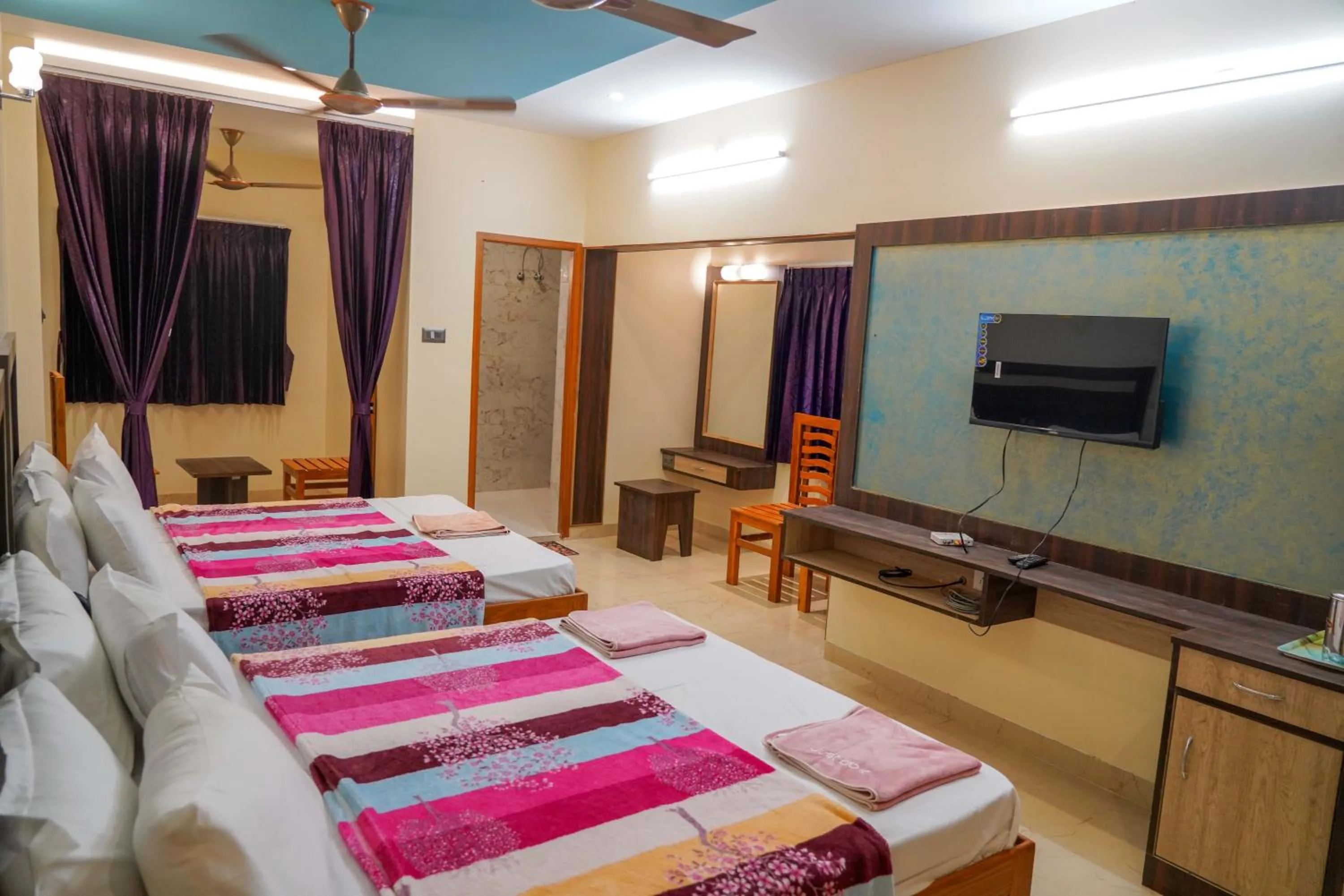 Bed in Bhavan Resorts