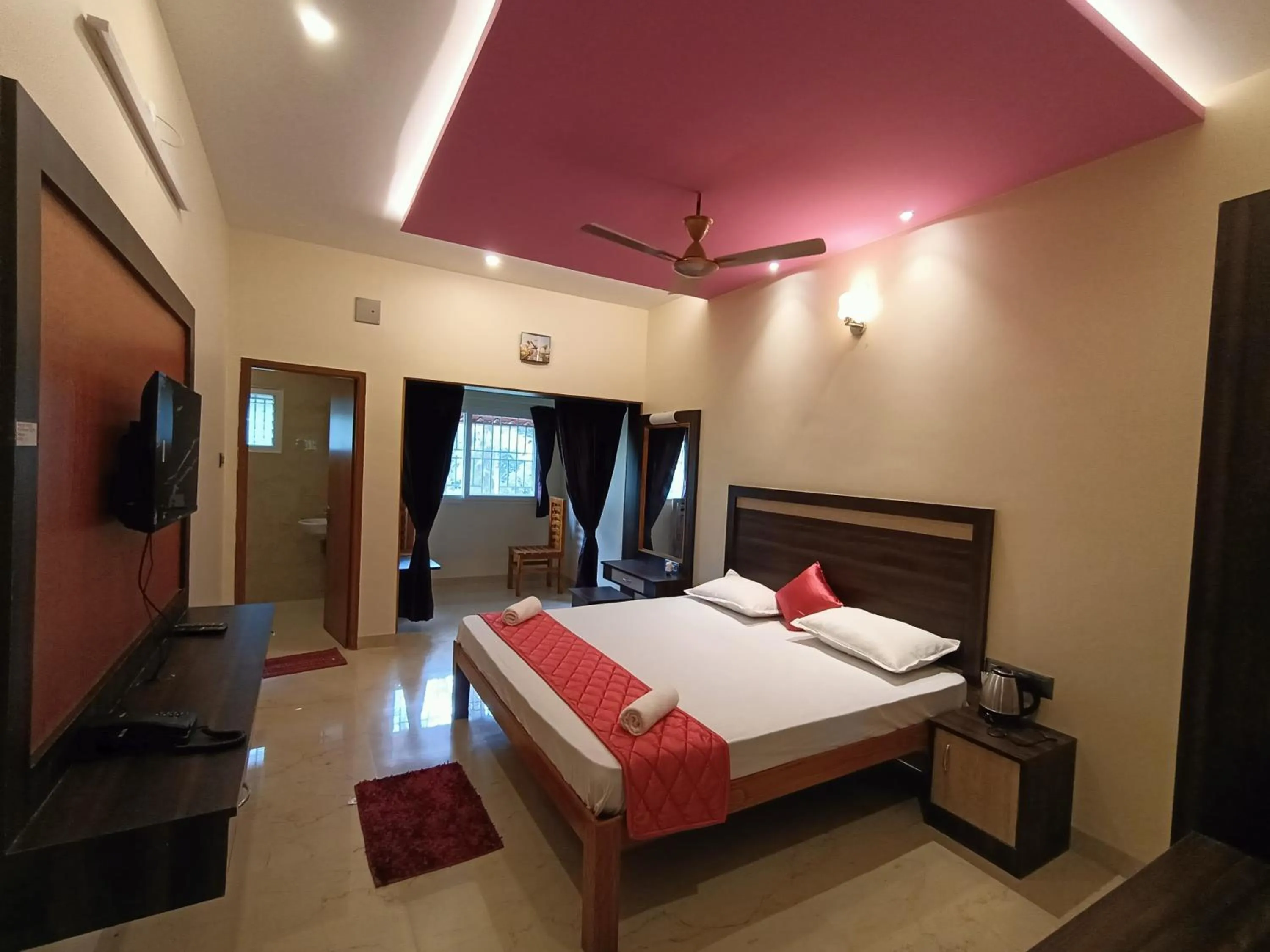 Photo of the whole room, Bed in Bhavan Resorts