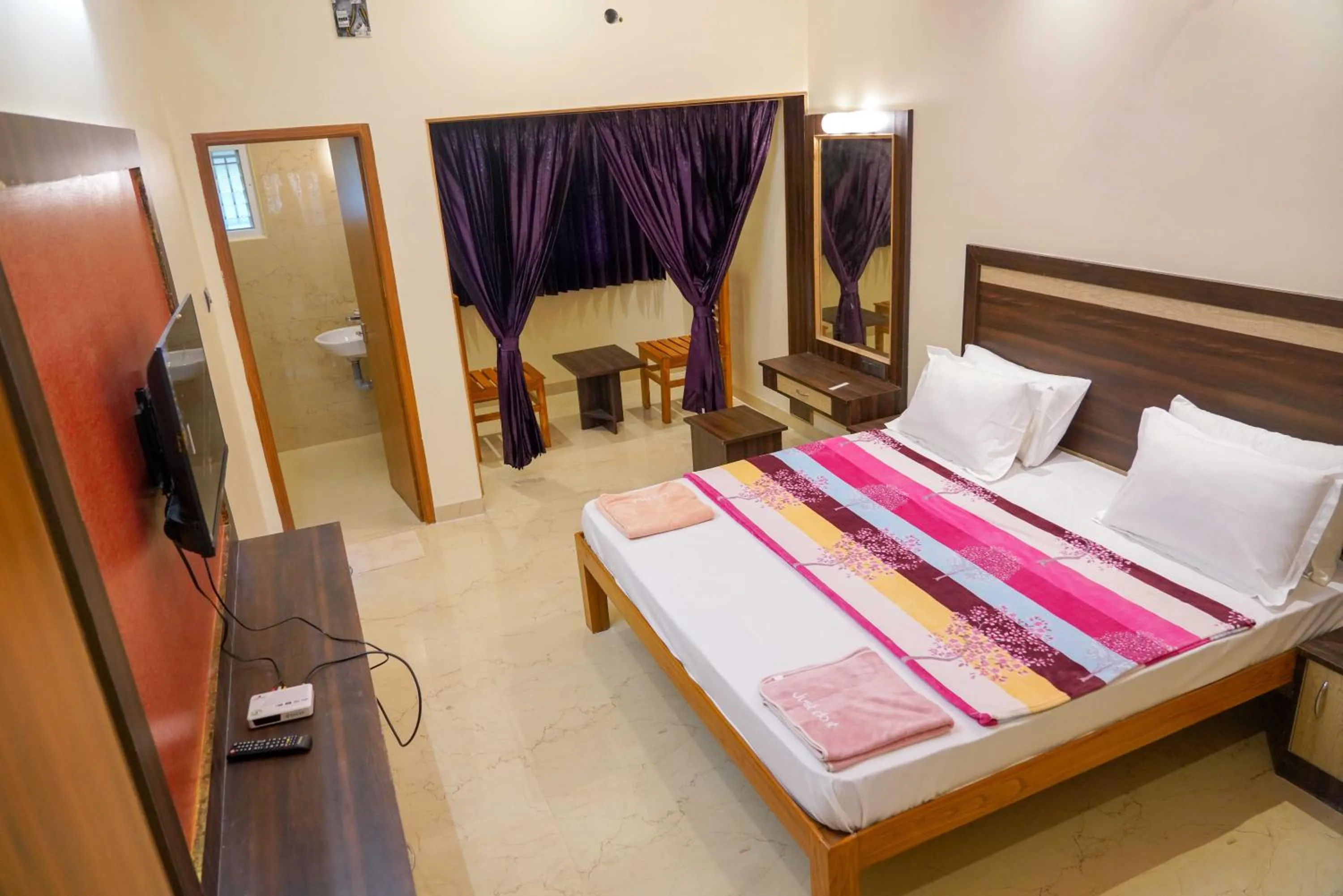 Bed in Bhavan Resorts