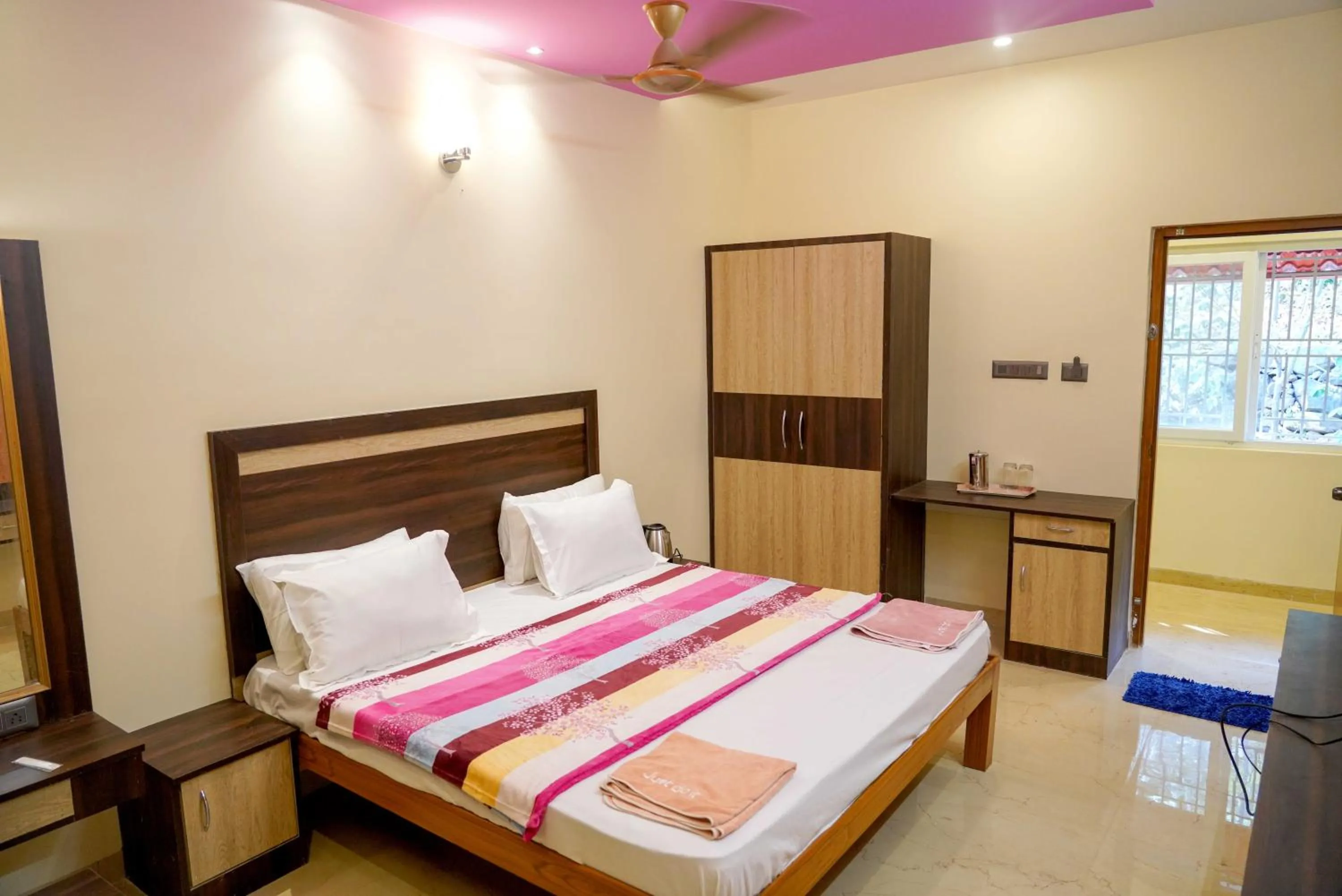 Bed in Bhavan Resorts