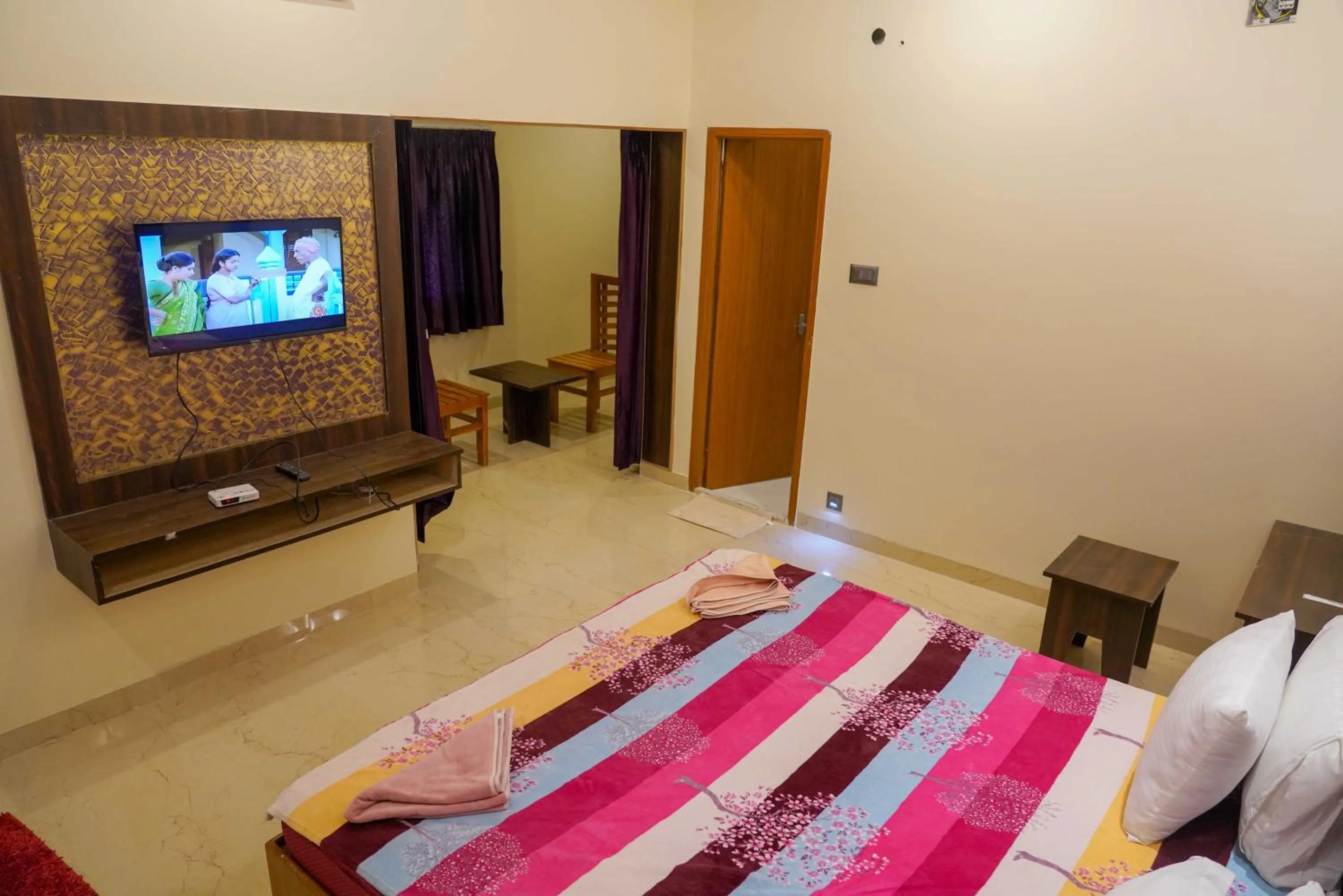 Bed in Bhavan Resorts