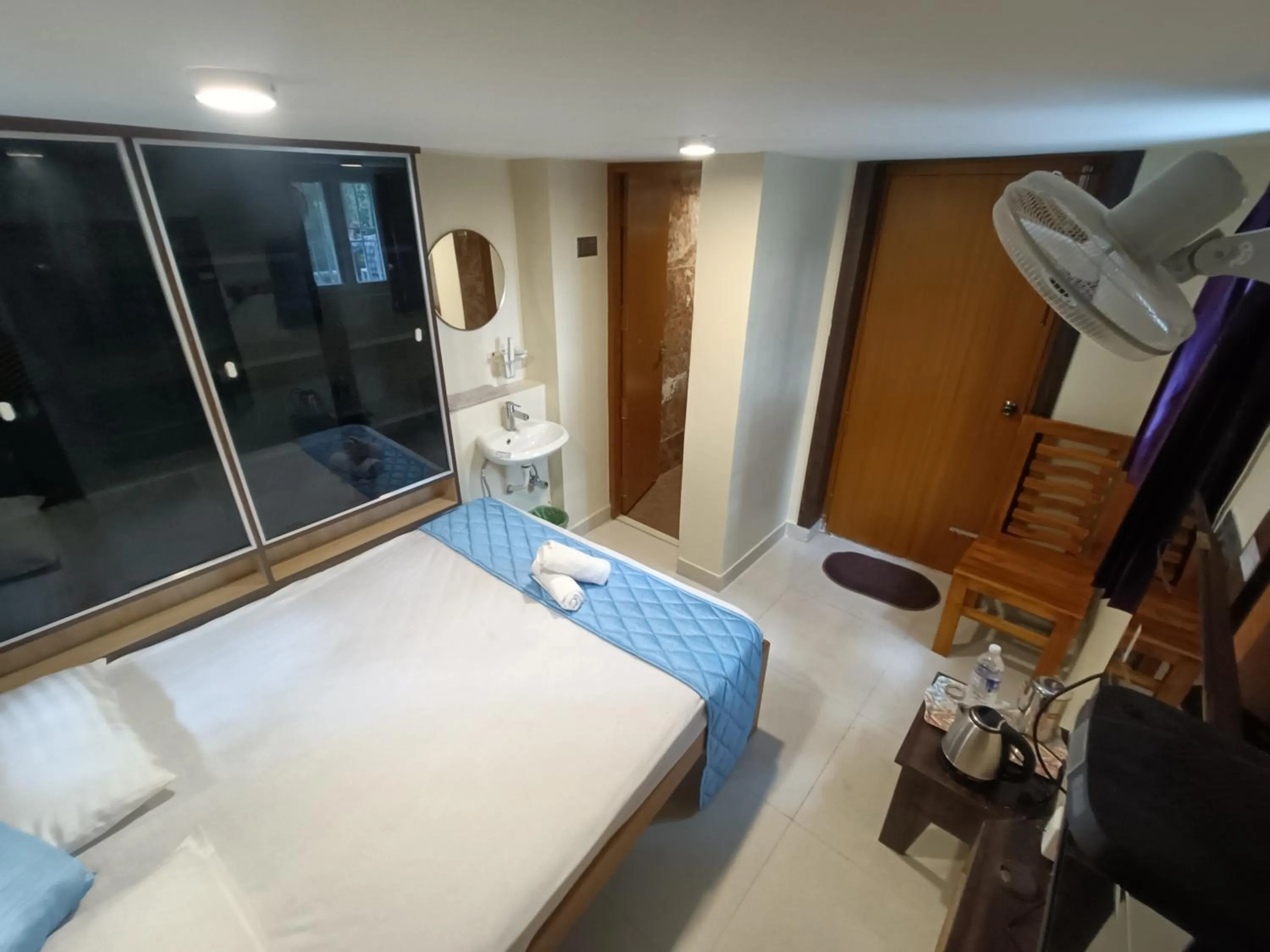 Photo of the whole room, Bed in Bhavan Resorts