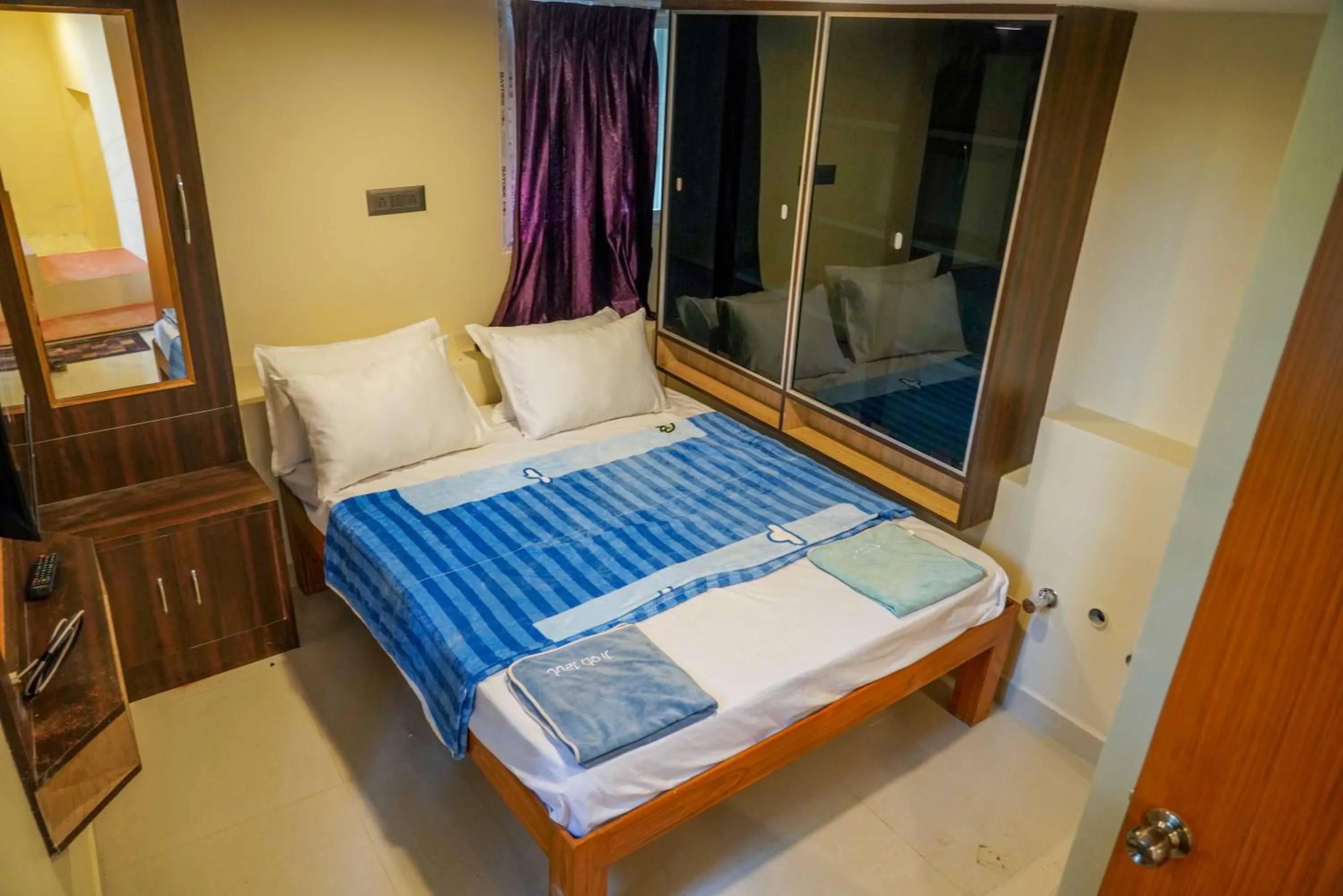 Bed in Bhavan Resorts