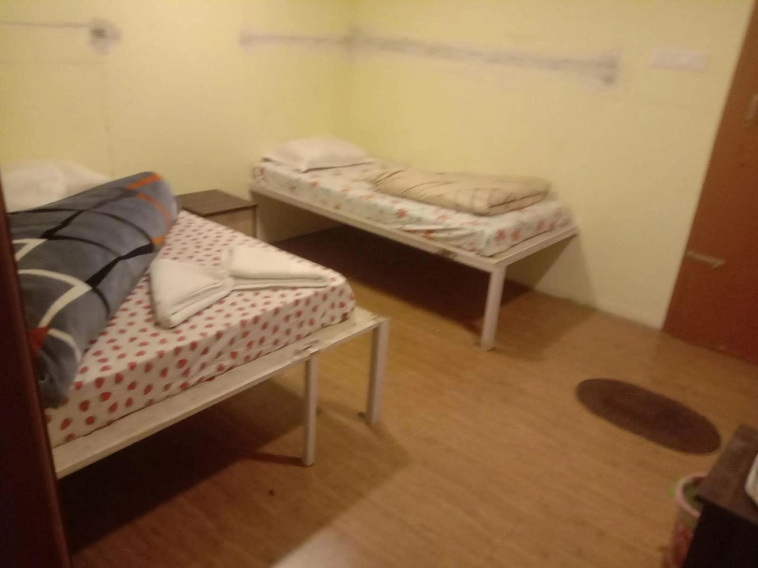 Bed in Bhavan Resorts