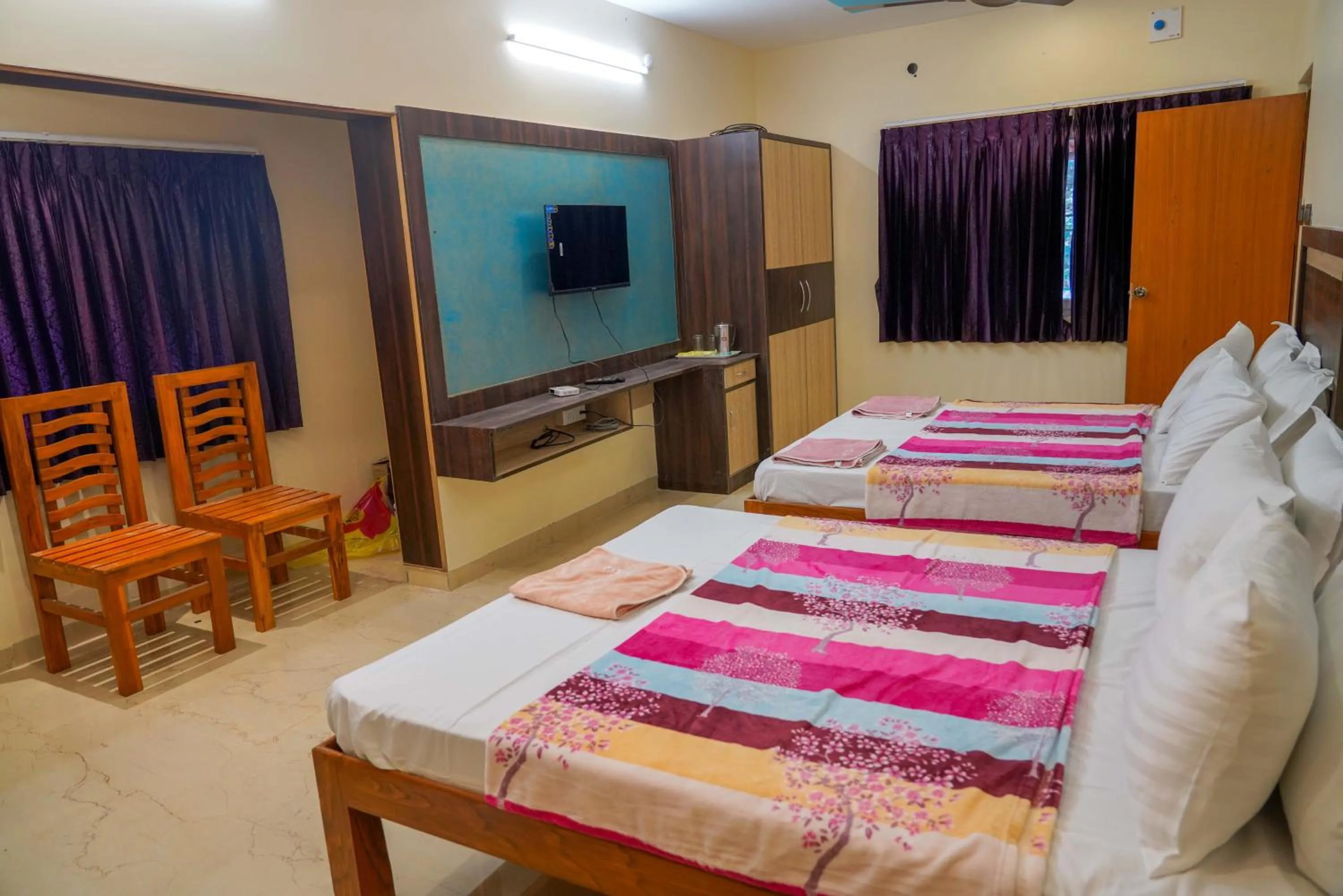 Bed in Bhavan Resorts