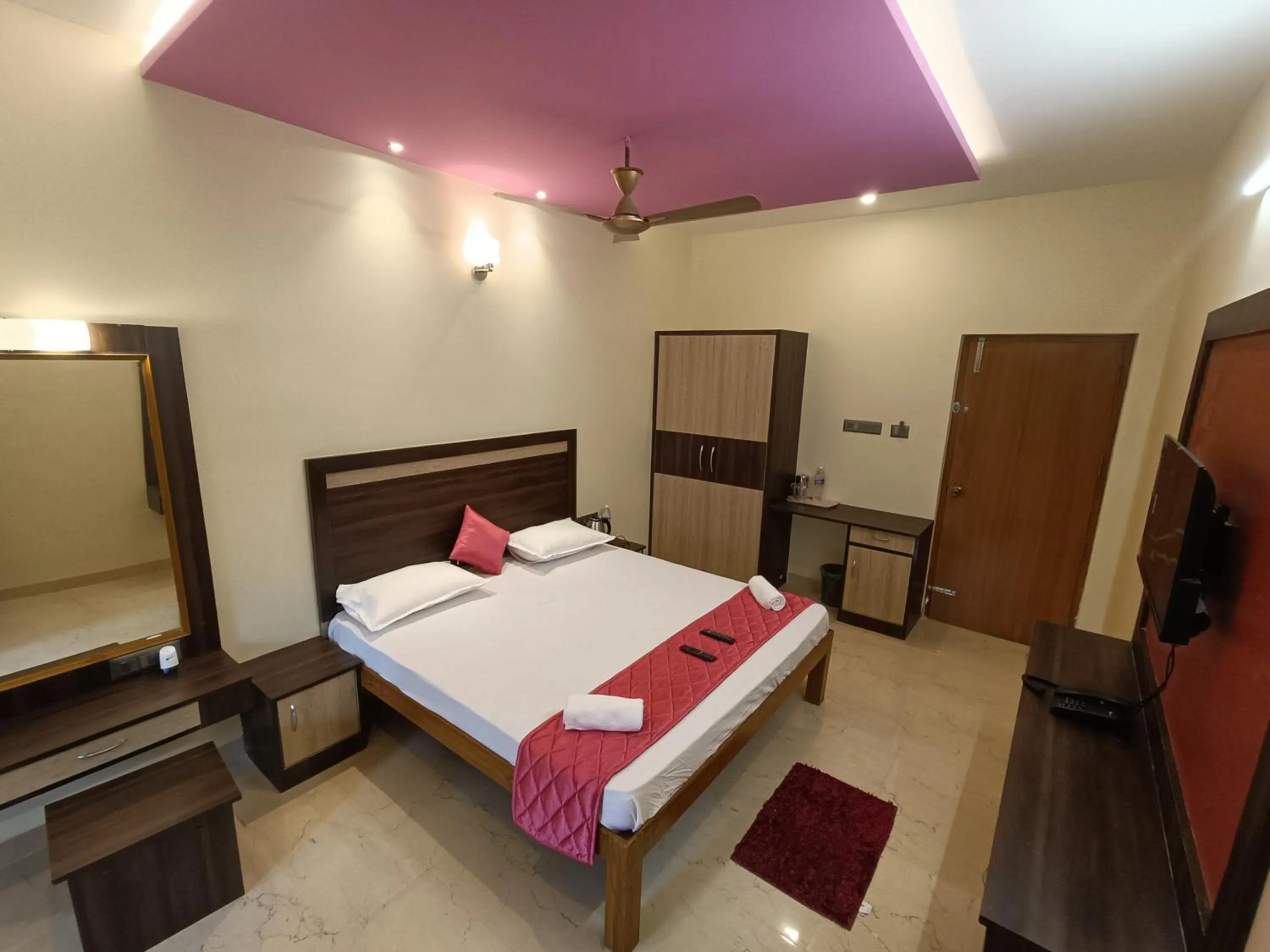 Photo of the whole room, Bed in Bhavan Resorts