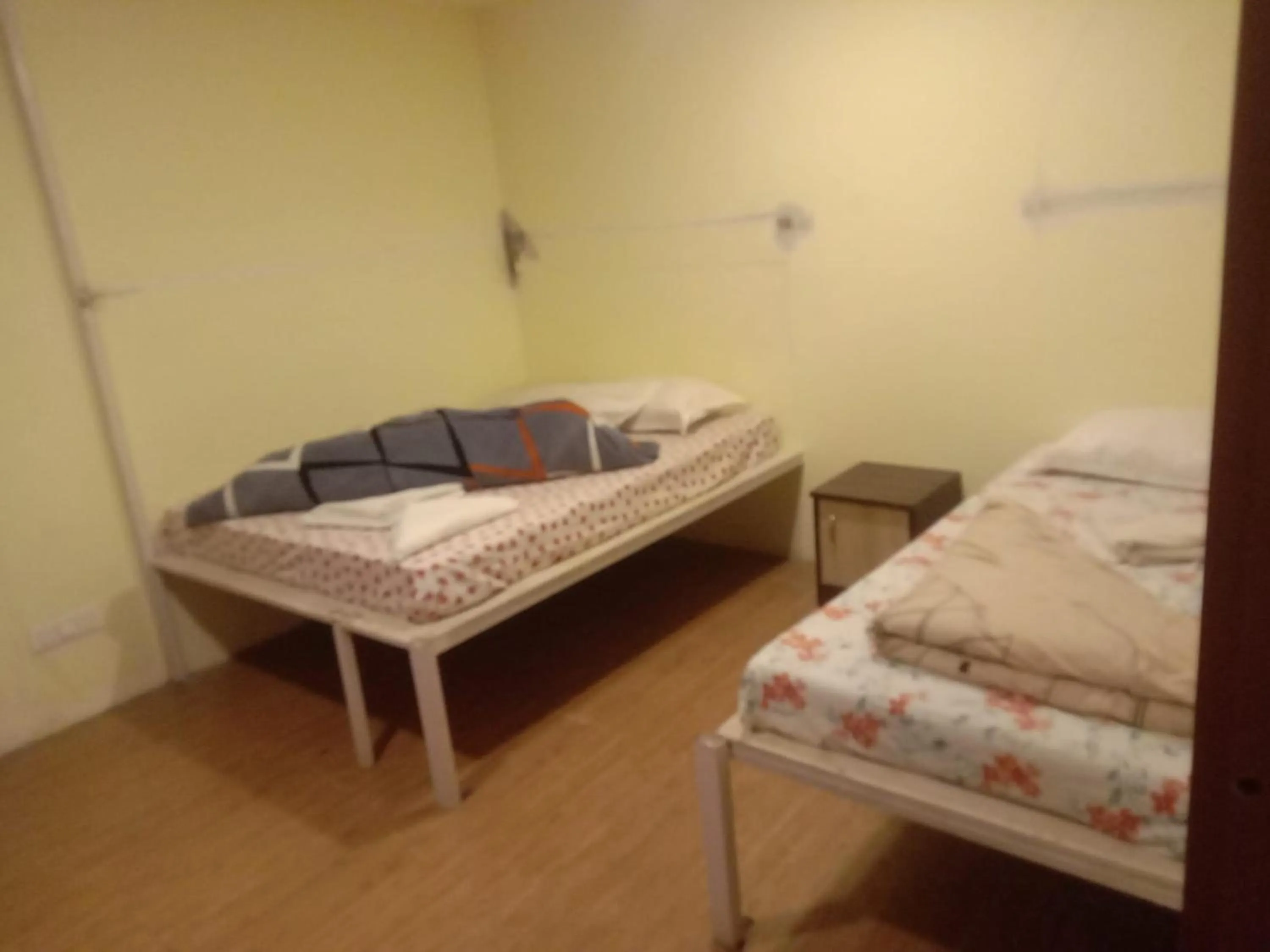 Bed in Bhavan Resorts