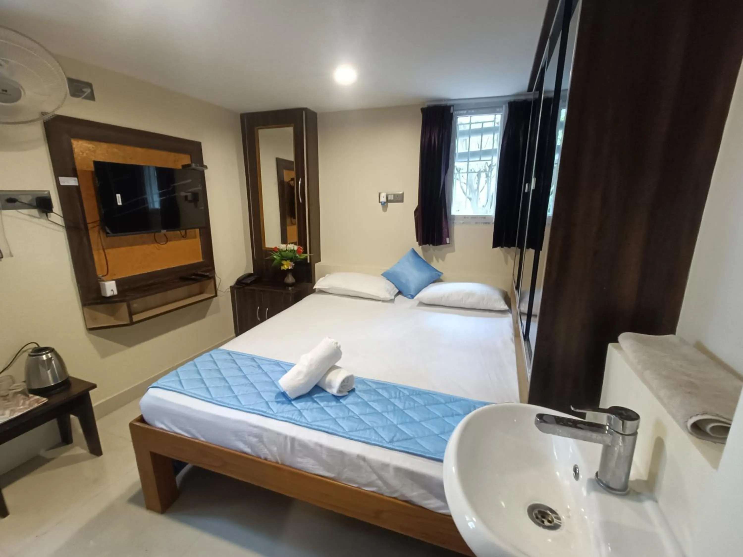 Bed in Bhavan Resorts