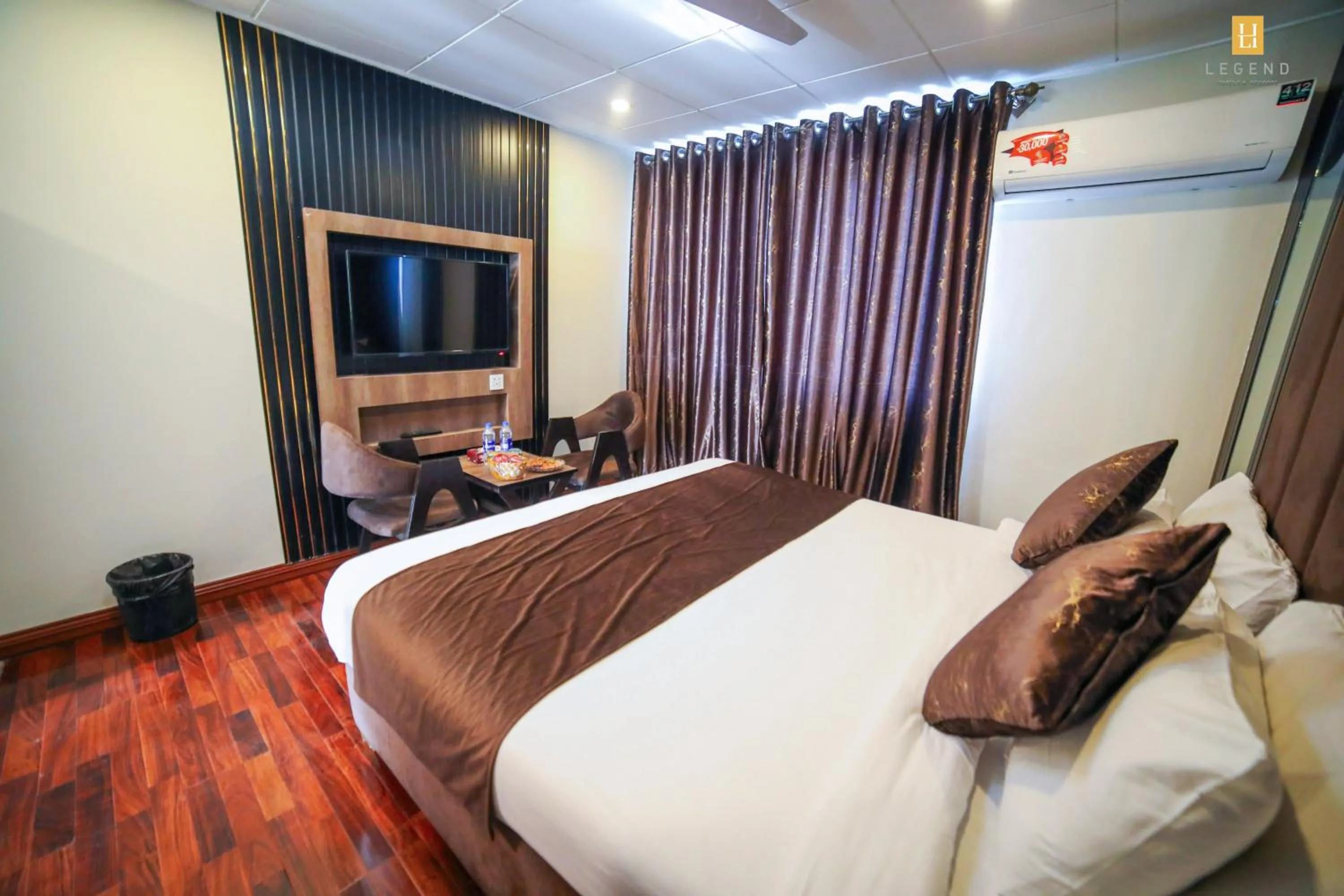 Bed in Legend Hotel Skardu