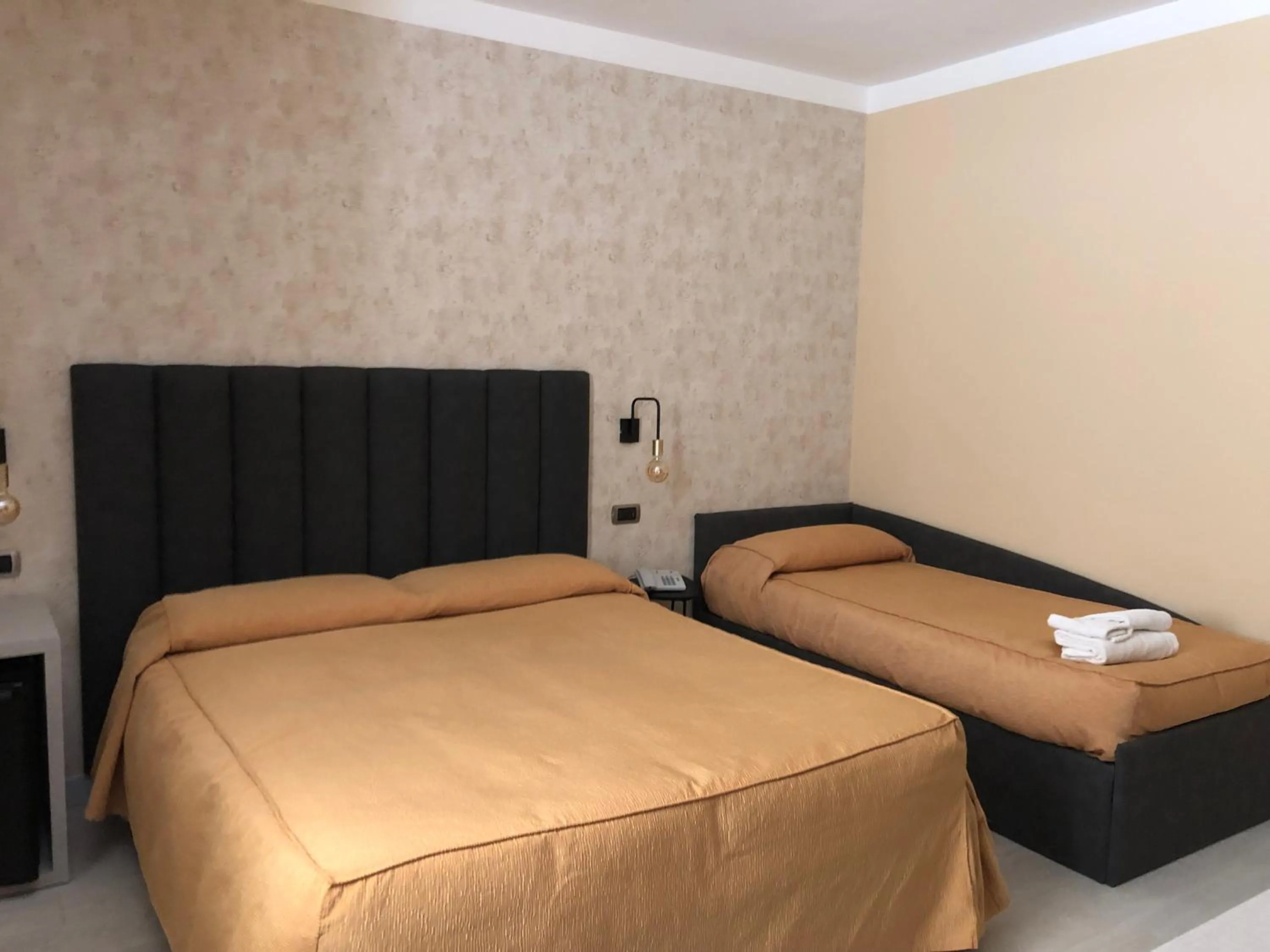 Bed in Hotel Tirrenia