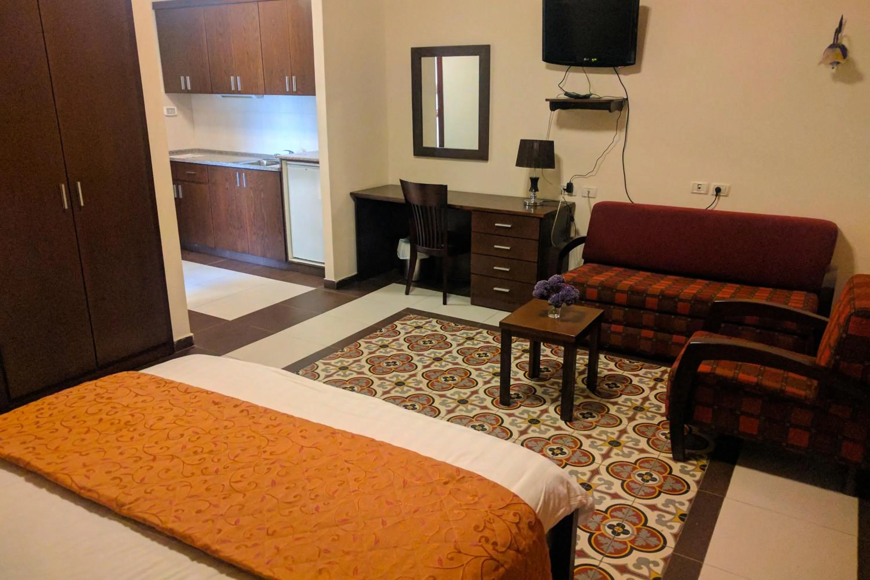 Photo of the whole room, Bed in Alhambra Palace Hotel Suites - Ramallah