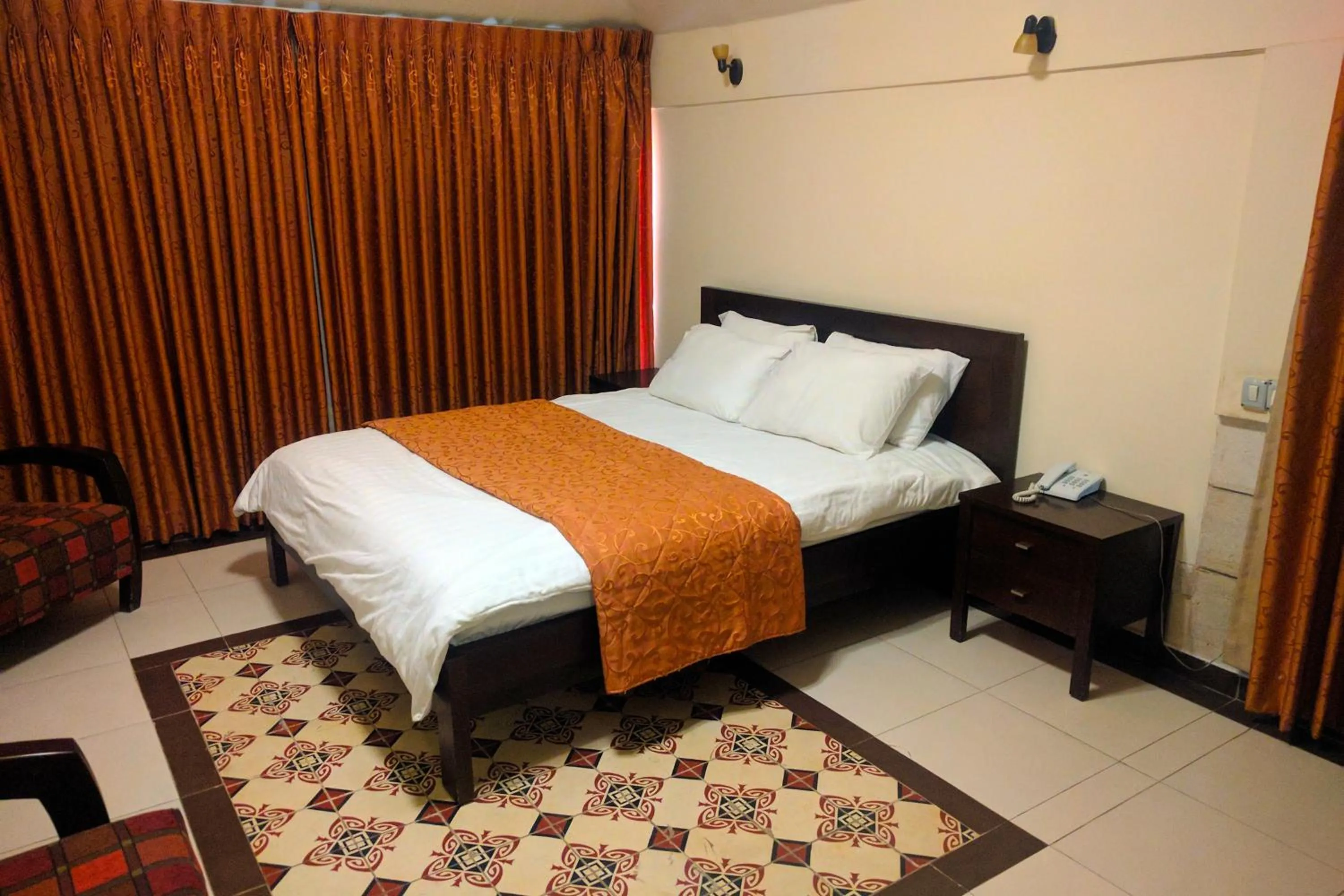 Photo of the whole room, Bed in Alhambra Palace Hotel Suites - Ramallah