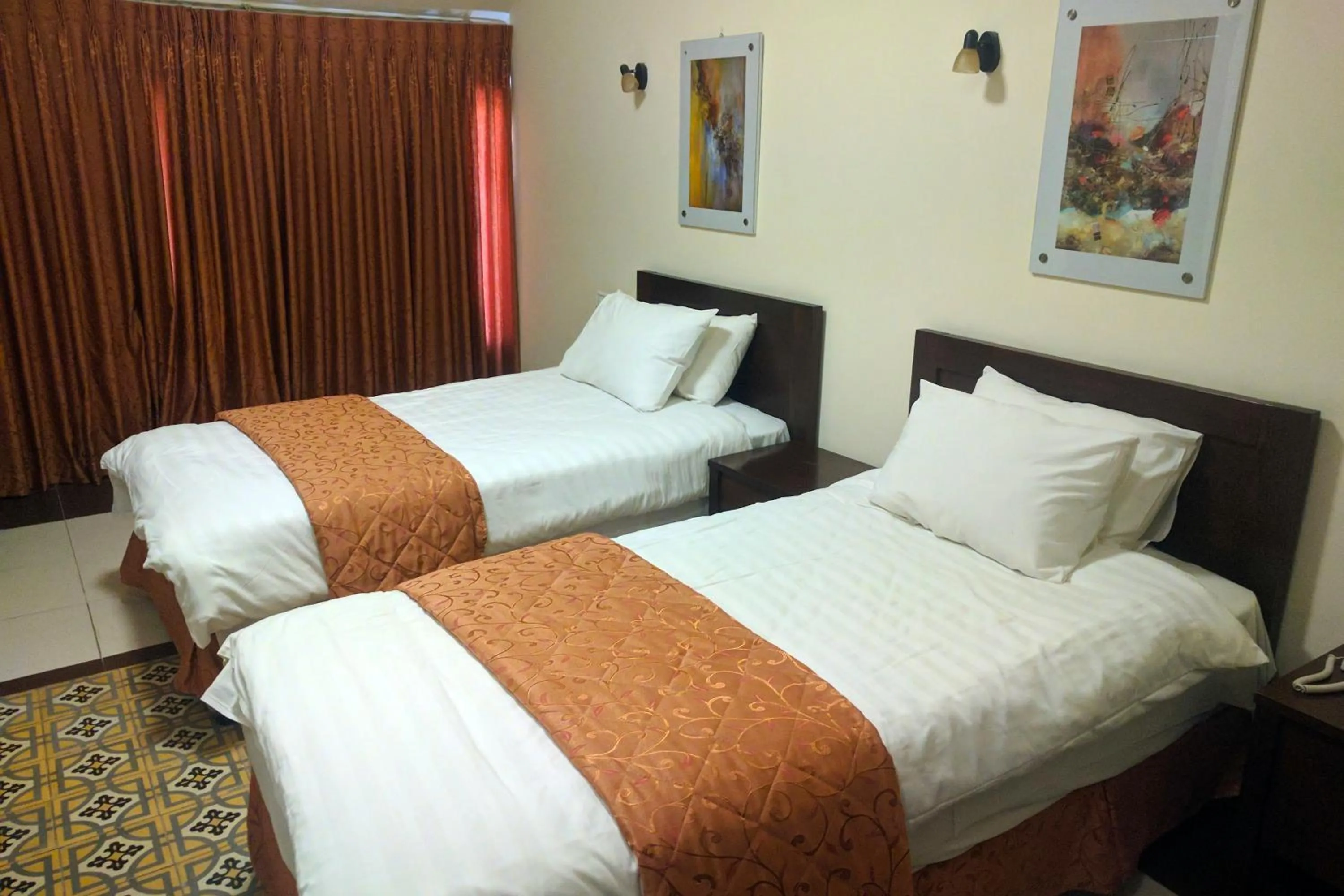 Bed in Alhambra Palace Hotel Suites - Ramallah