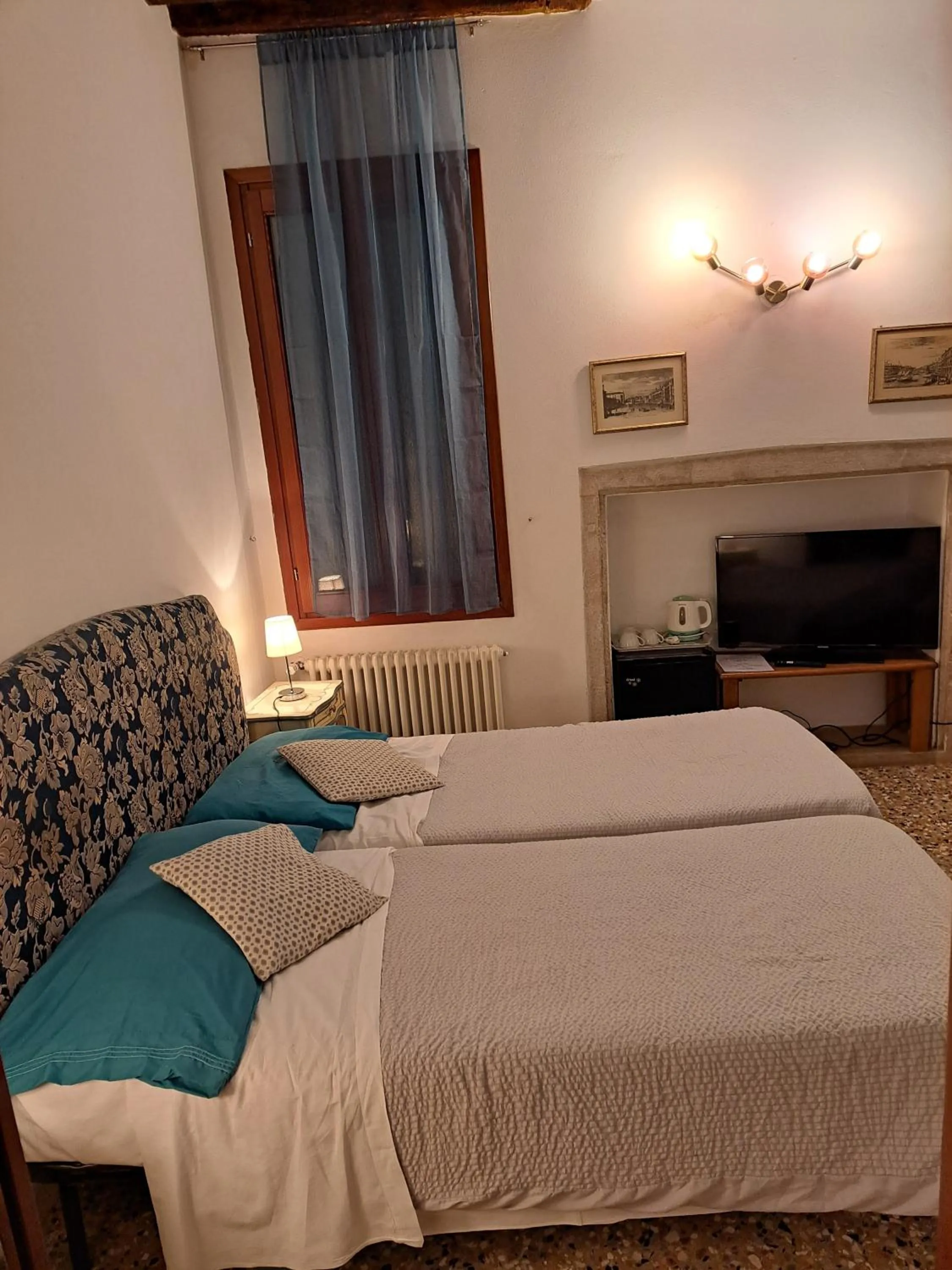 Bed in Locanda Ca' Formosa