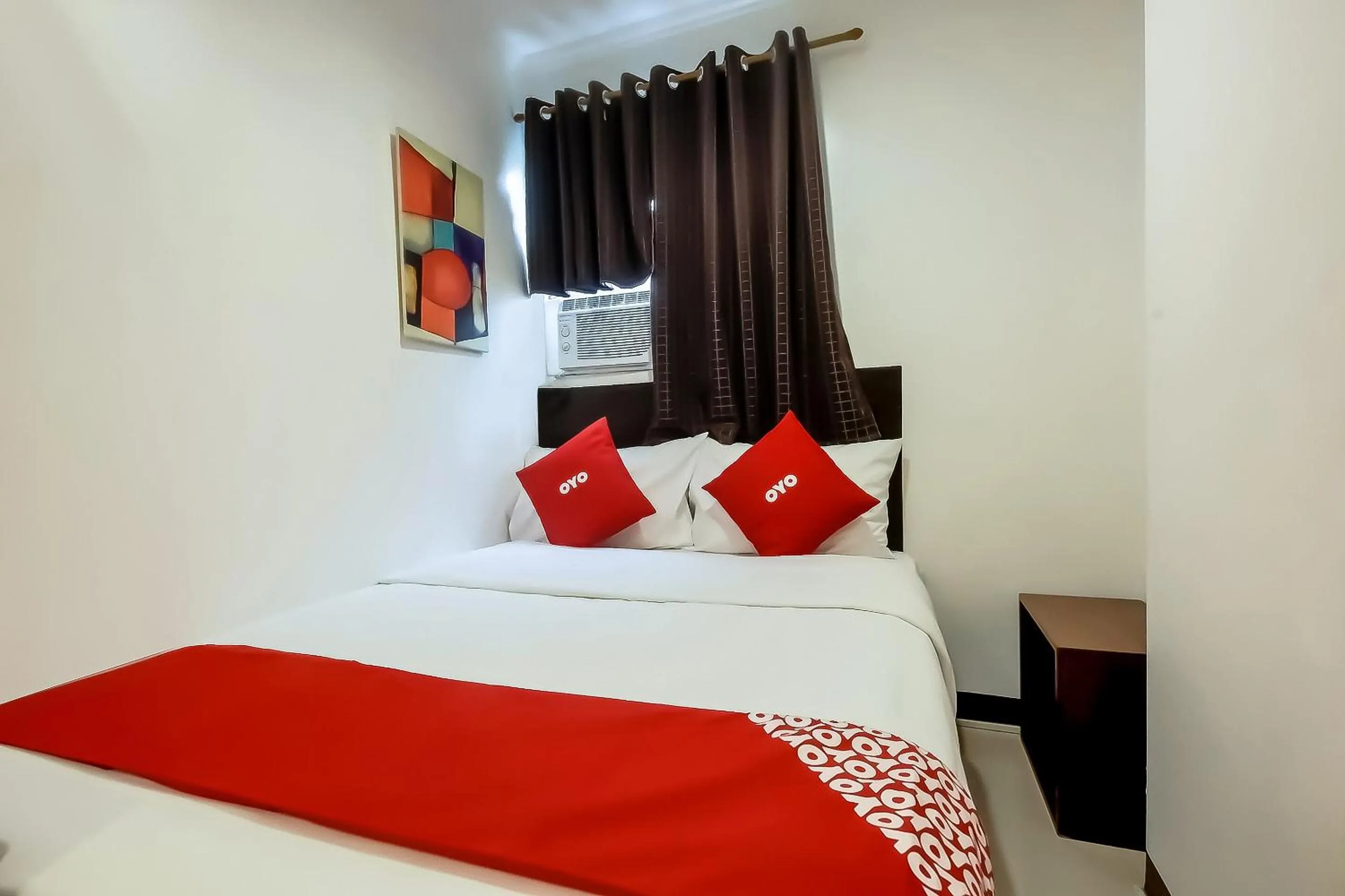 Bedroom in Super OYO 856 City Stay Inns Slex Makati