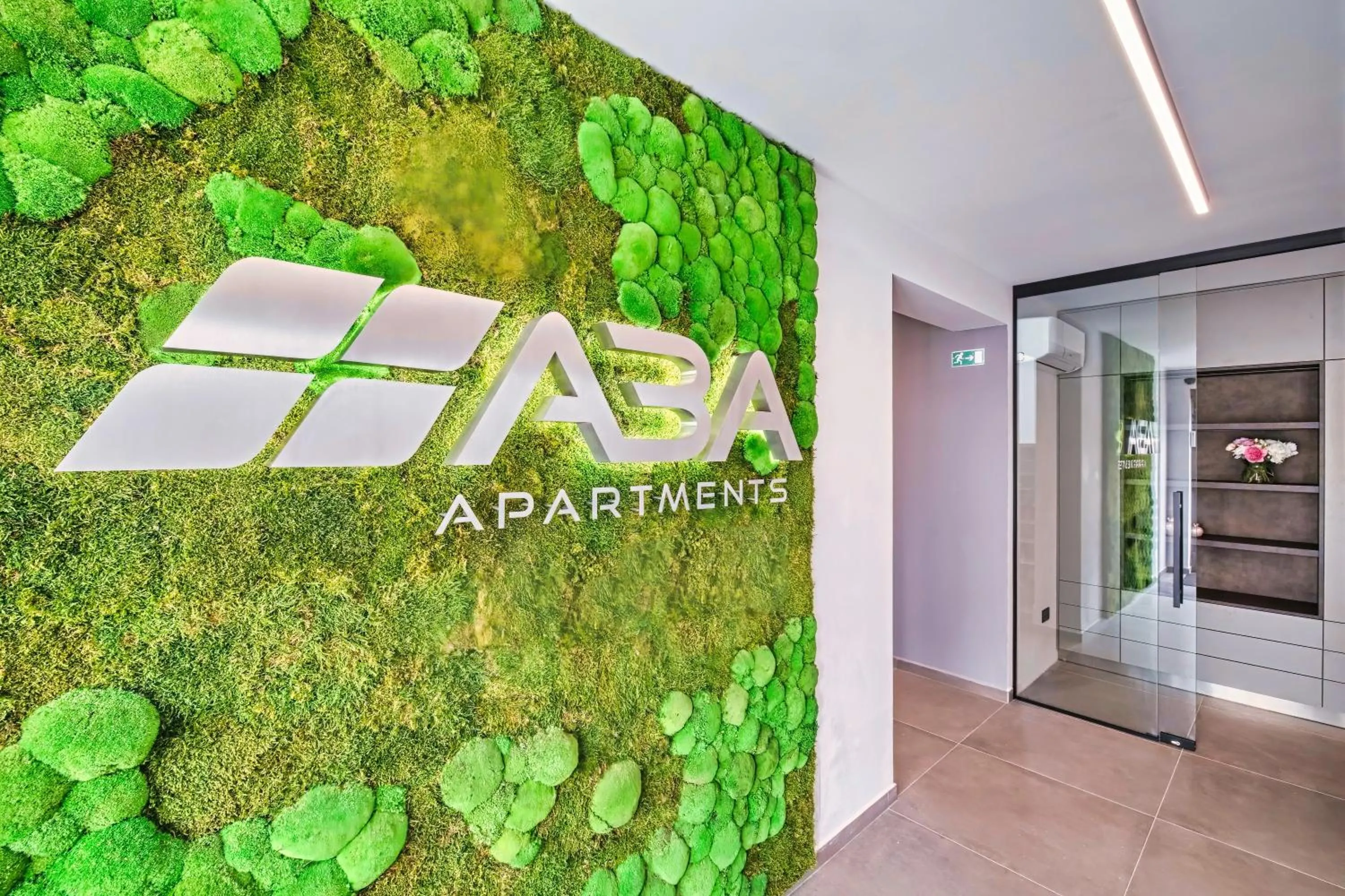 Property logo or sign in ABA Apartments