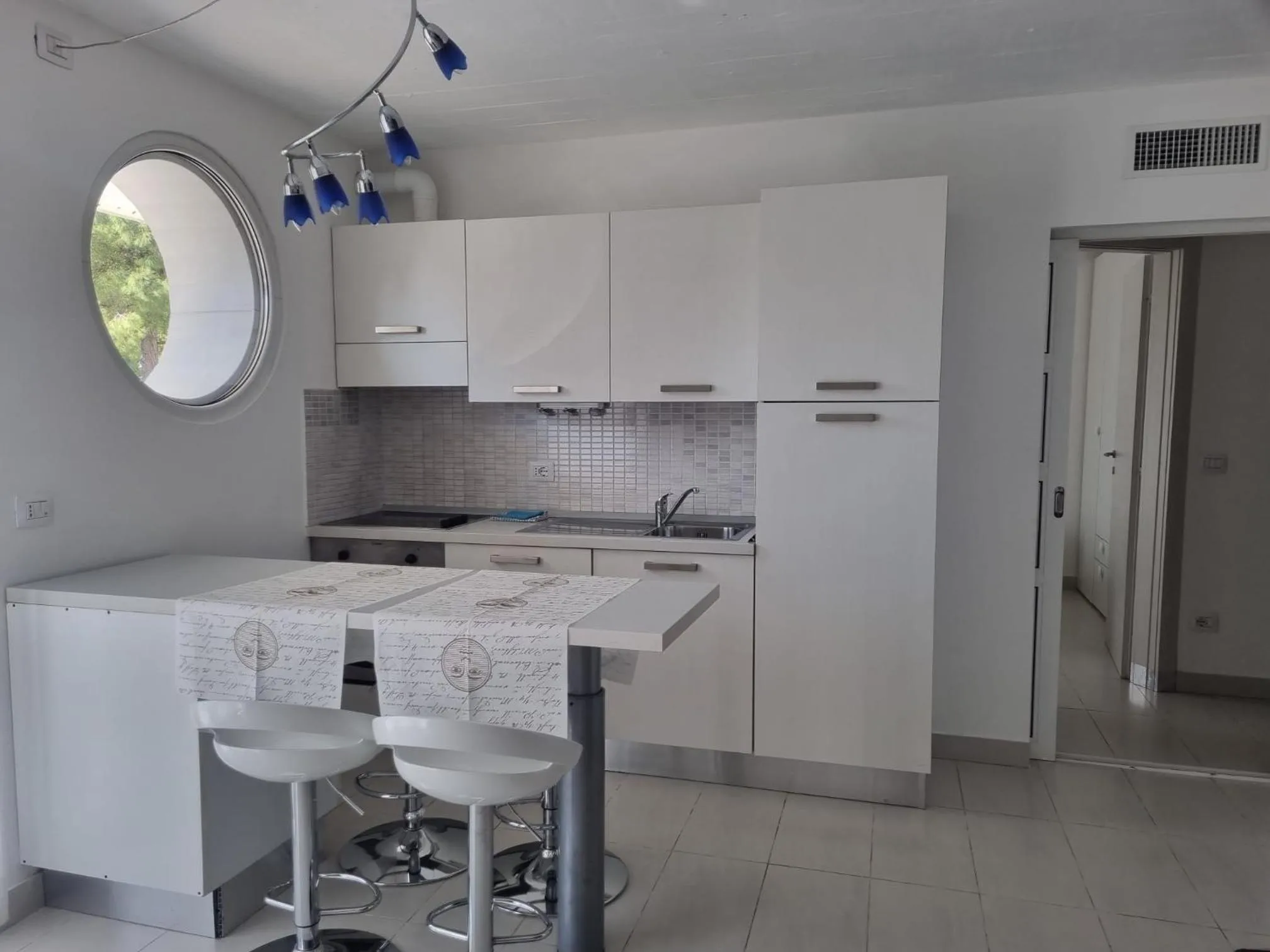 Kitchen or kitchenette in Aparthotel Holiday