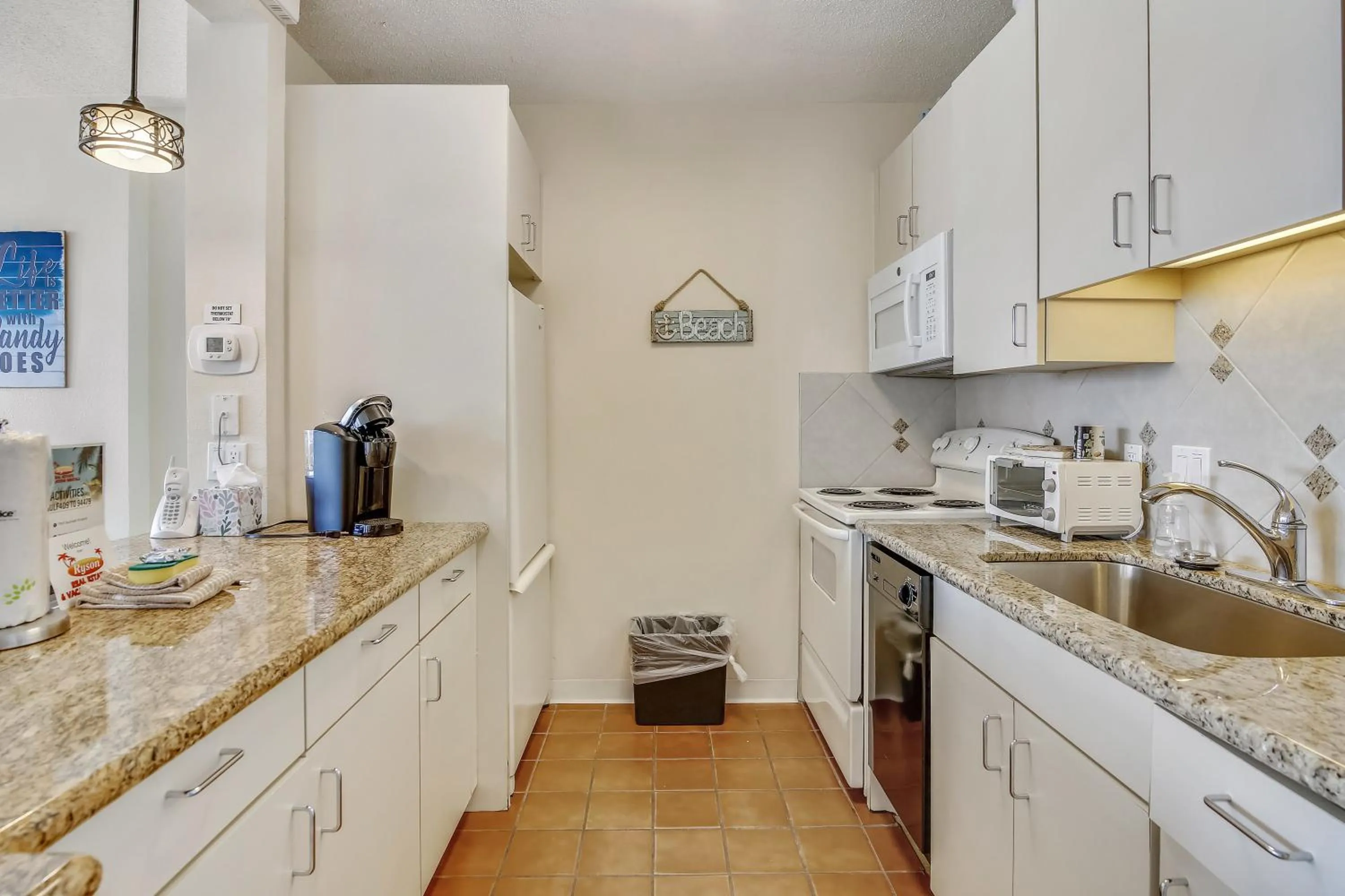 Kitchen or kitchenette in Galvestonian 1002-Beachfront Getaway