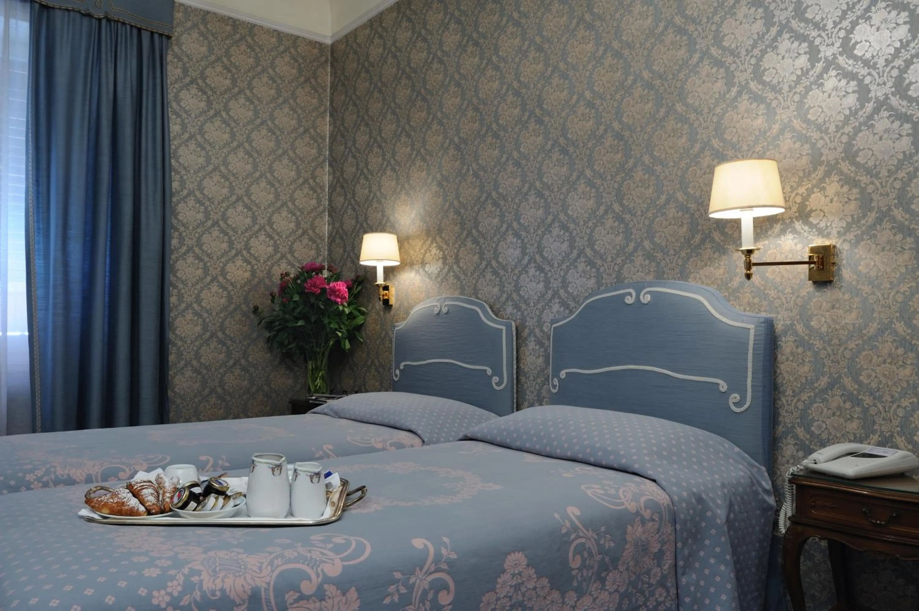 Bed in Hotel Giulio Cesare