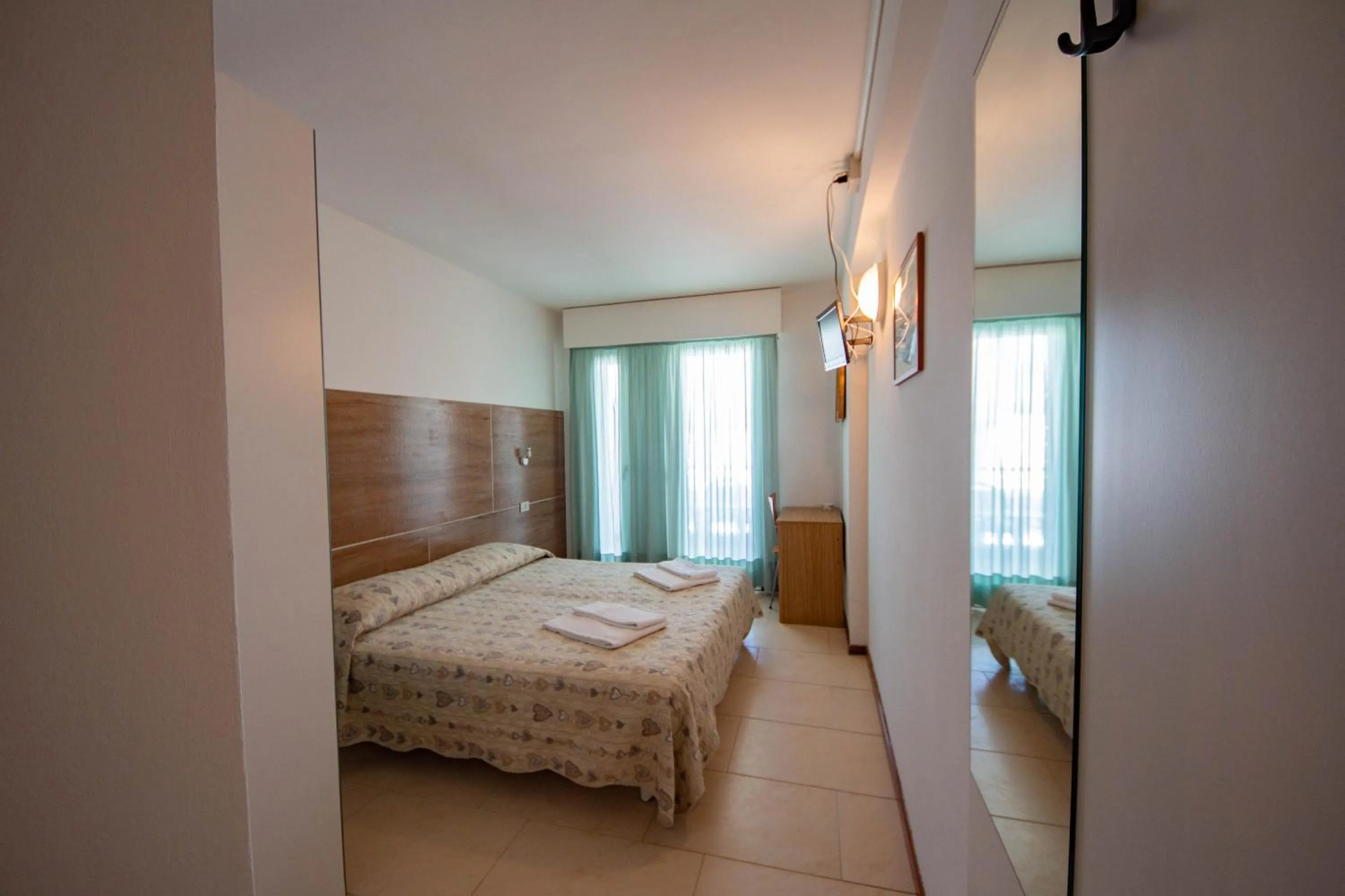 Bedroom in Hotel Ambra