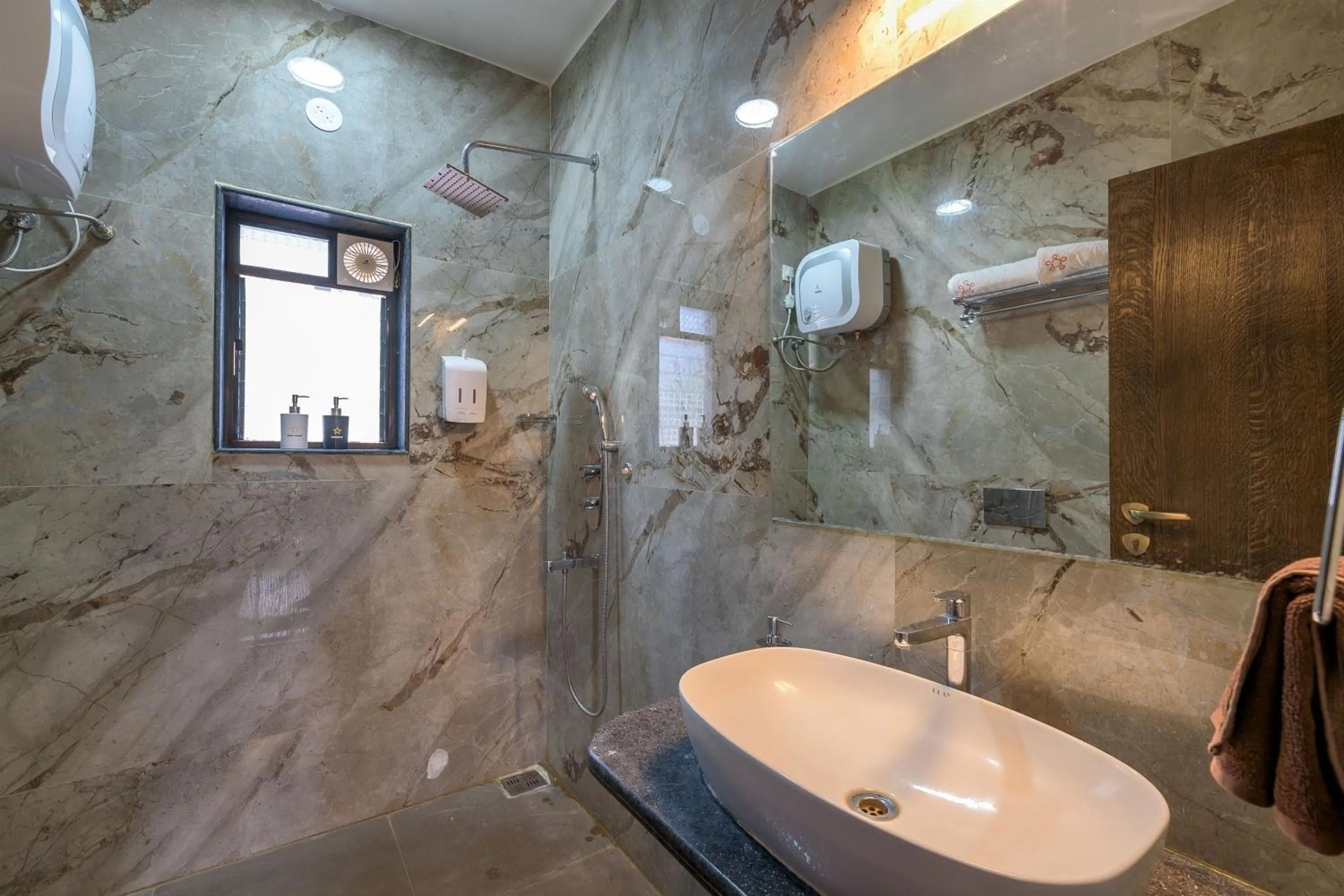 Shower in SaffronStays Eden - 3BR vineyard-side pool villa with jacuzzi, farm dining, stargazing deck & lawns for celebrations