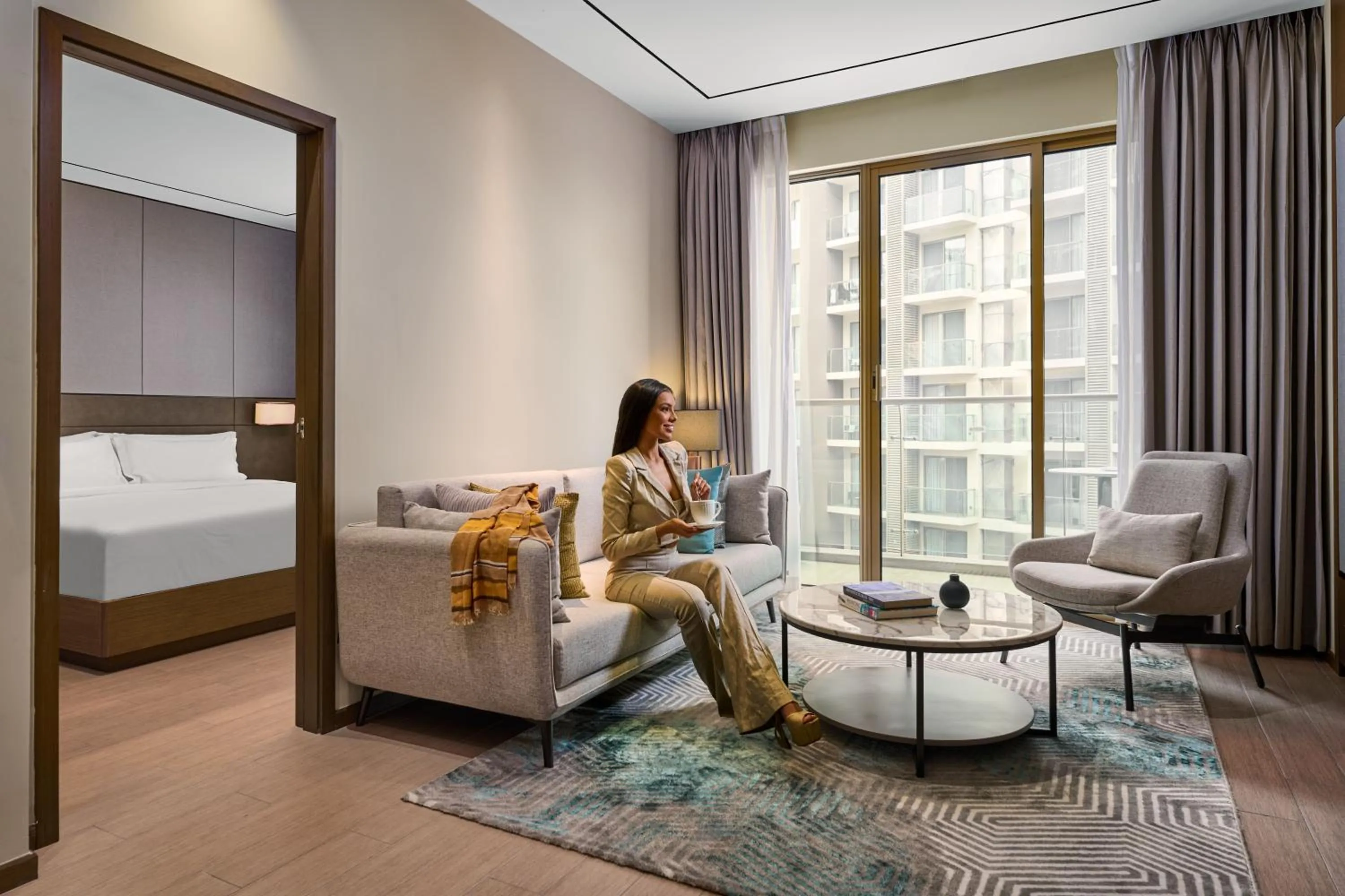 Living room, Bed in Oakwood Premier Phnom Penh