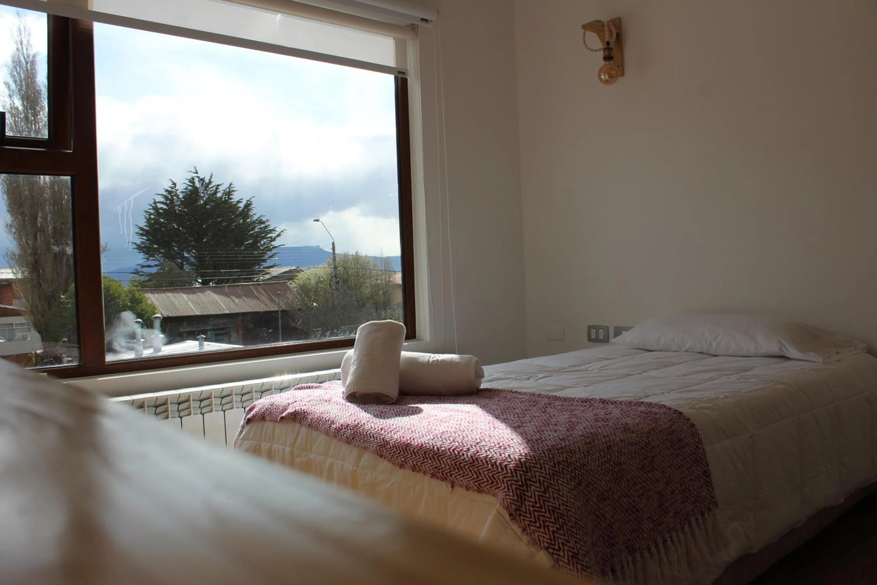 Bed in Hostal Alamo Patagonico