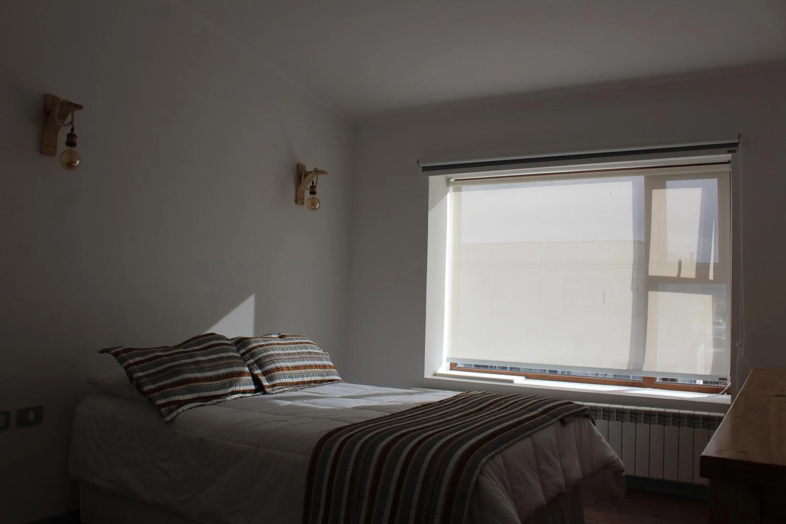 Bed in Hostal Alamo Patagonico