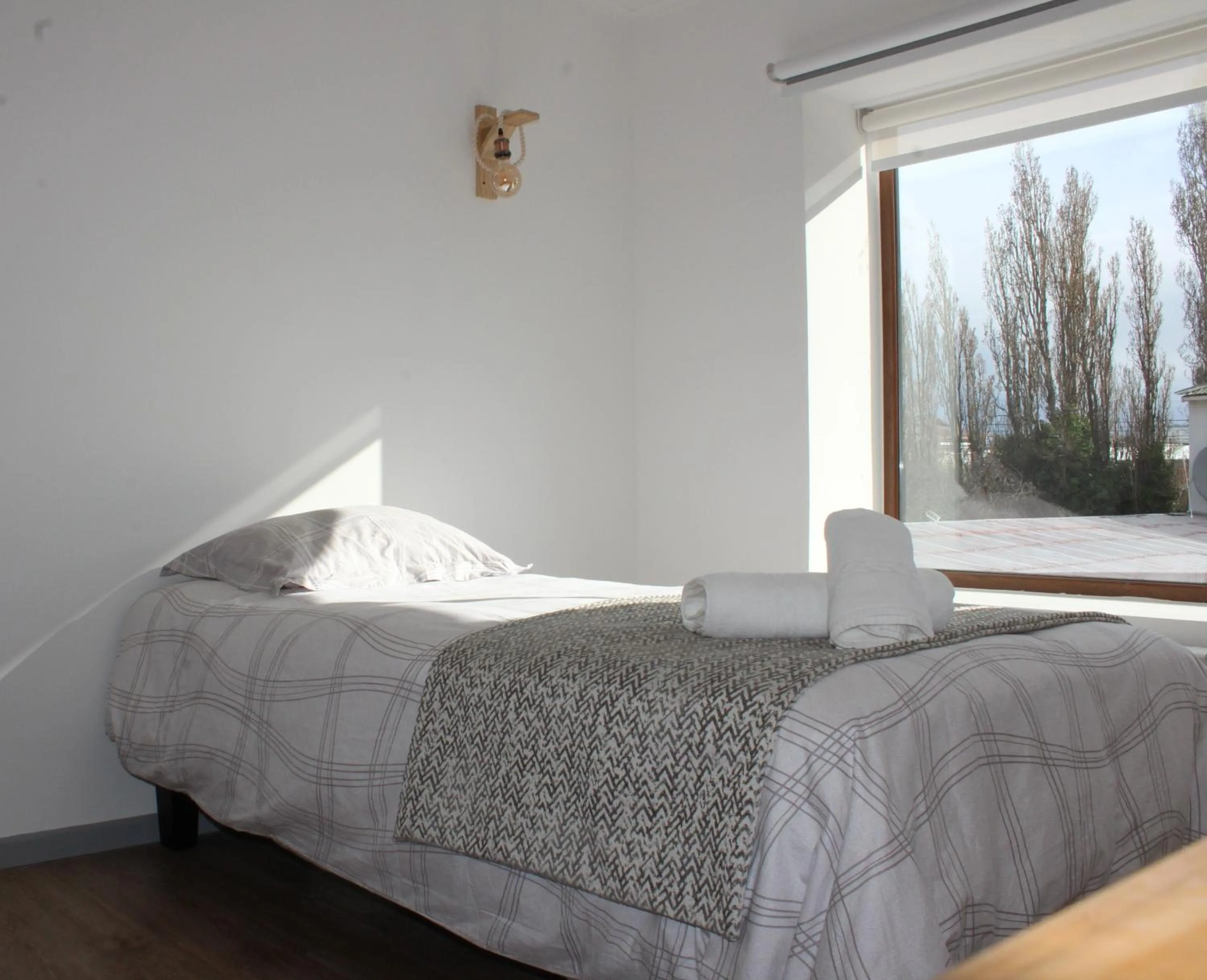 Bed in Hostal Alamo Patagonico