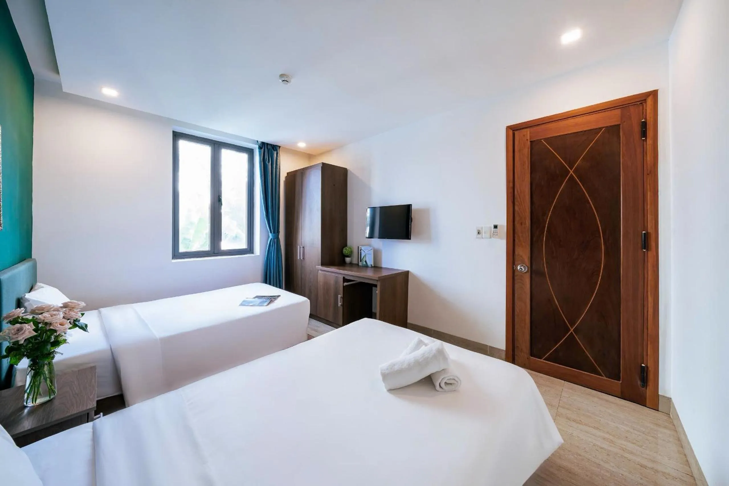 TV and multimedia, Bed in Ocean Garden Boutique Da Nang by Haviland