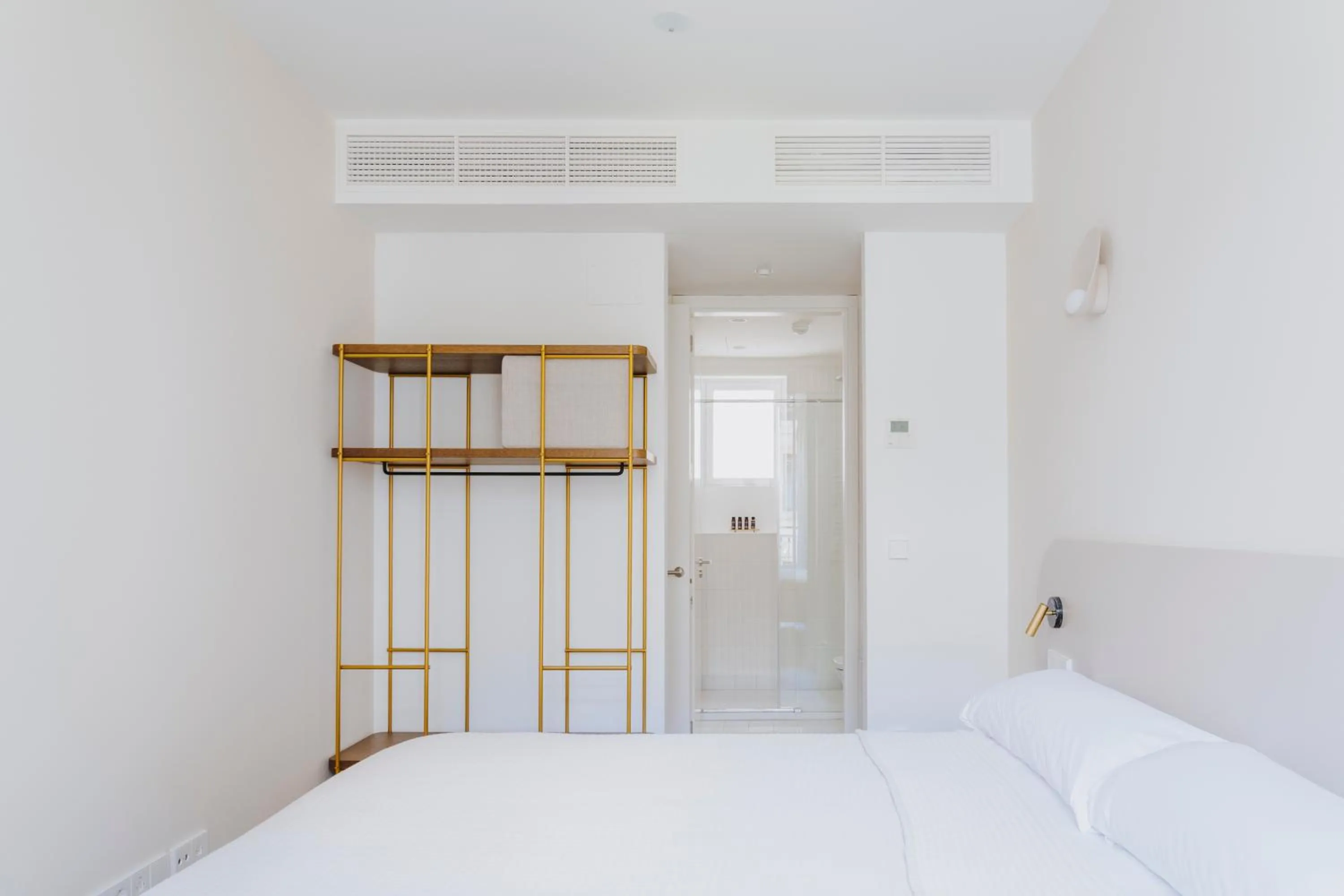 Bed in The Passage Apartments