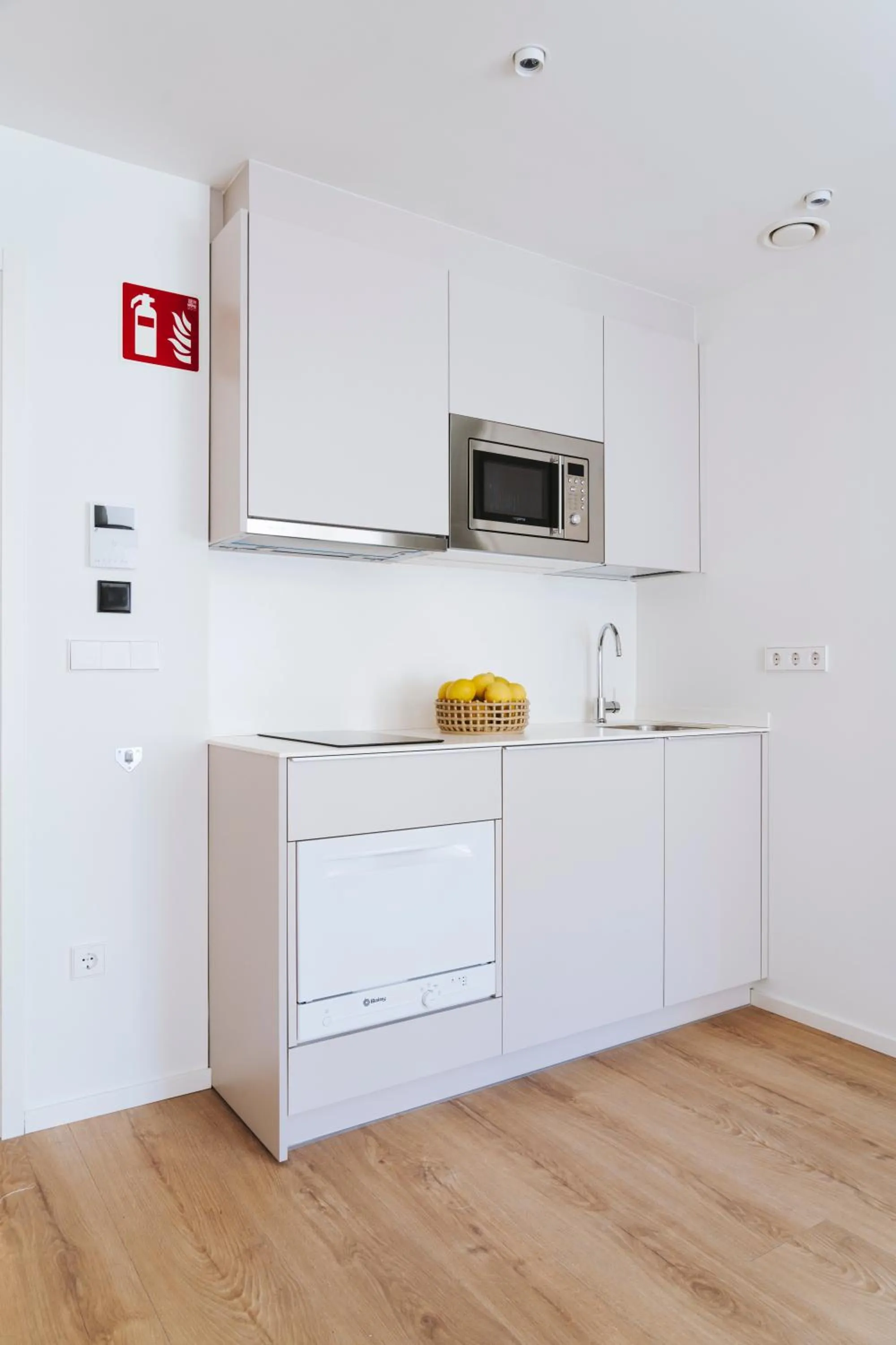Kitchen or kitchenette in The Passage Apartments