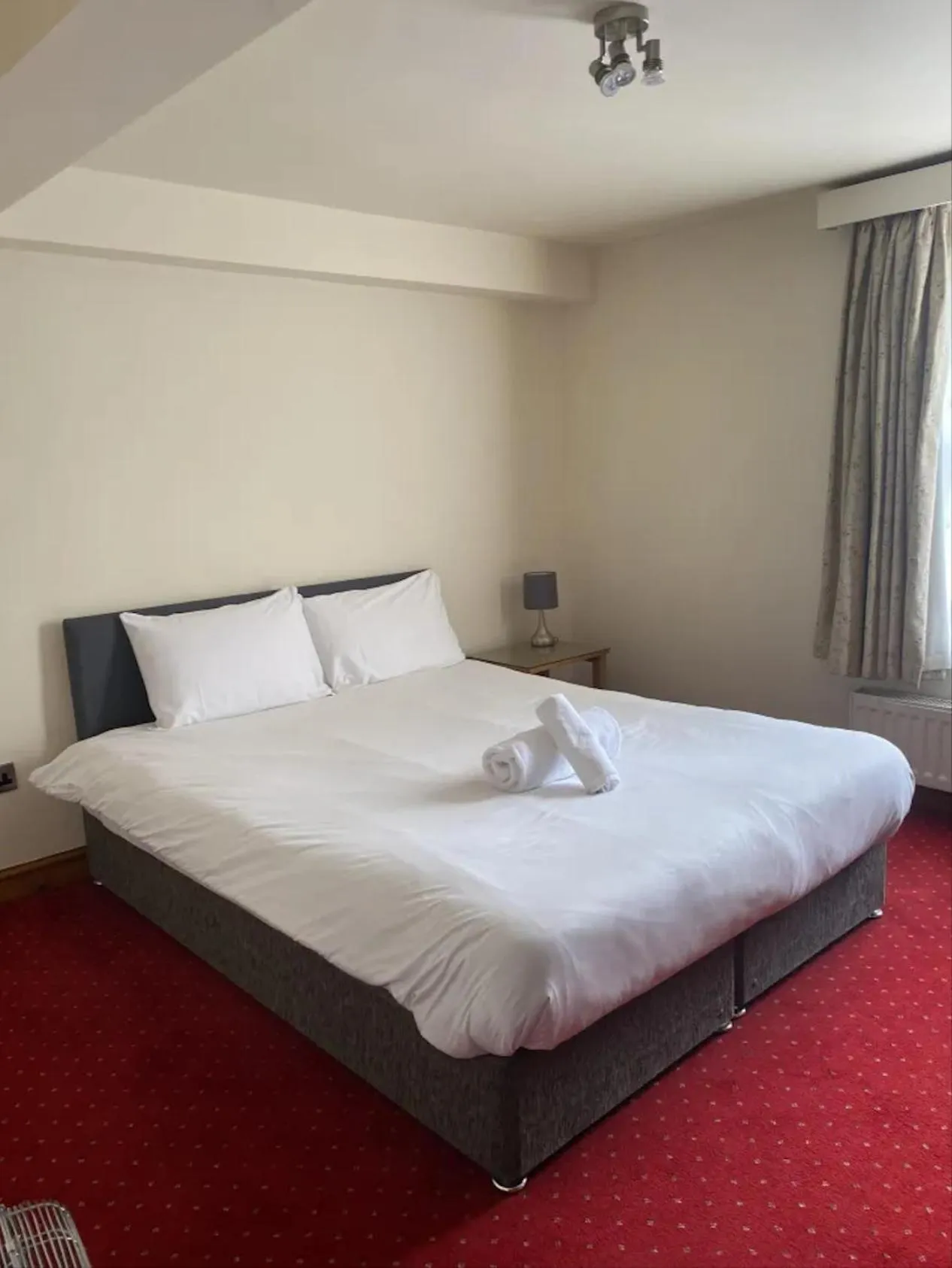 Bed in The Knighton Apartment