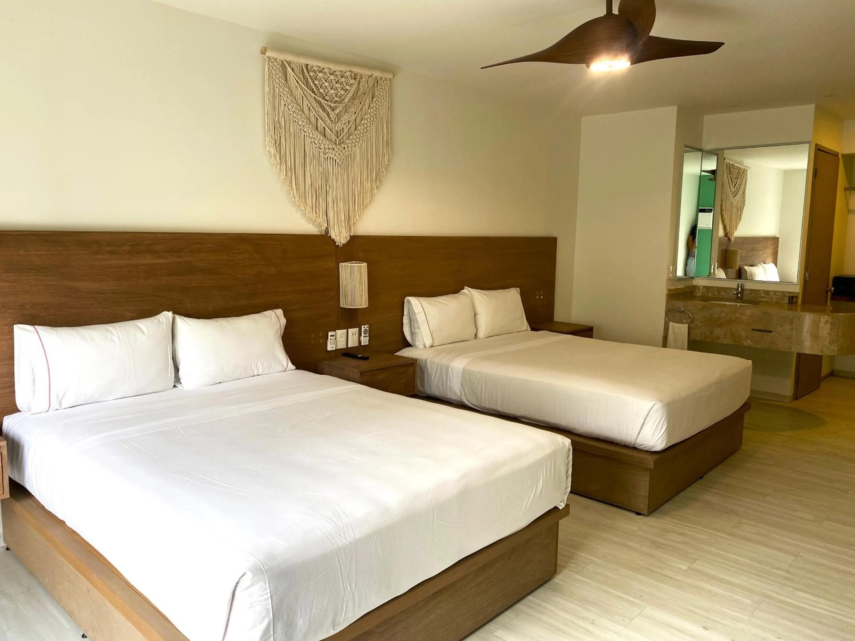 Bed in Siente Tulum Hotel & Cenote Club