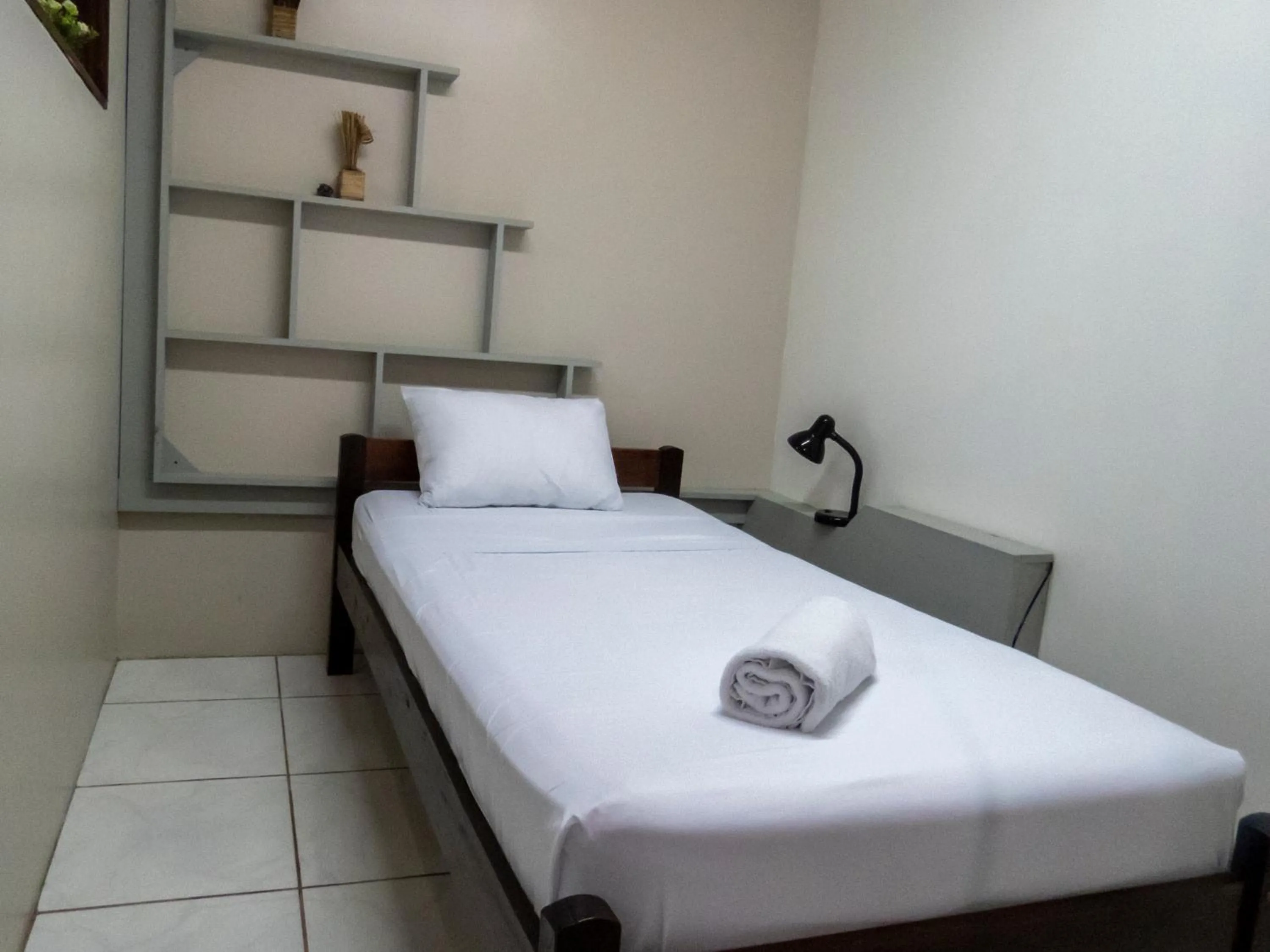 Bed in Coati Arenal Lodge