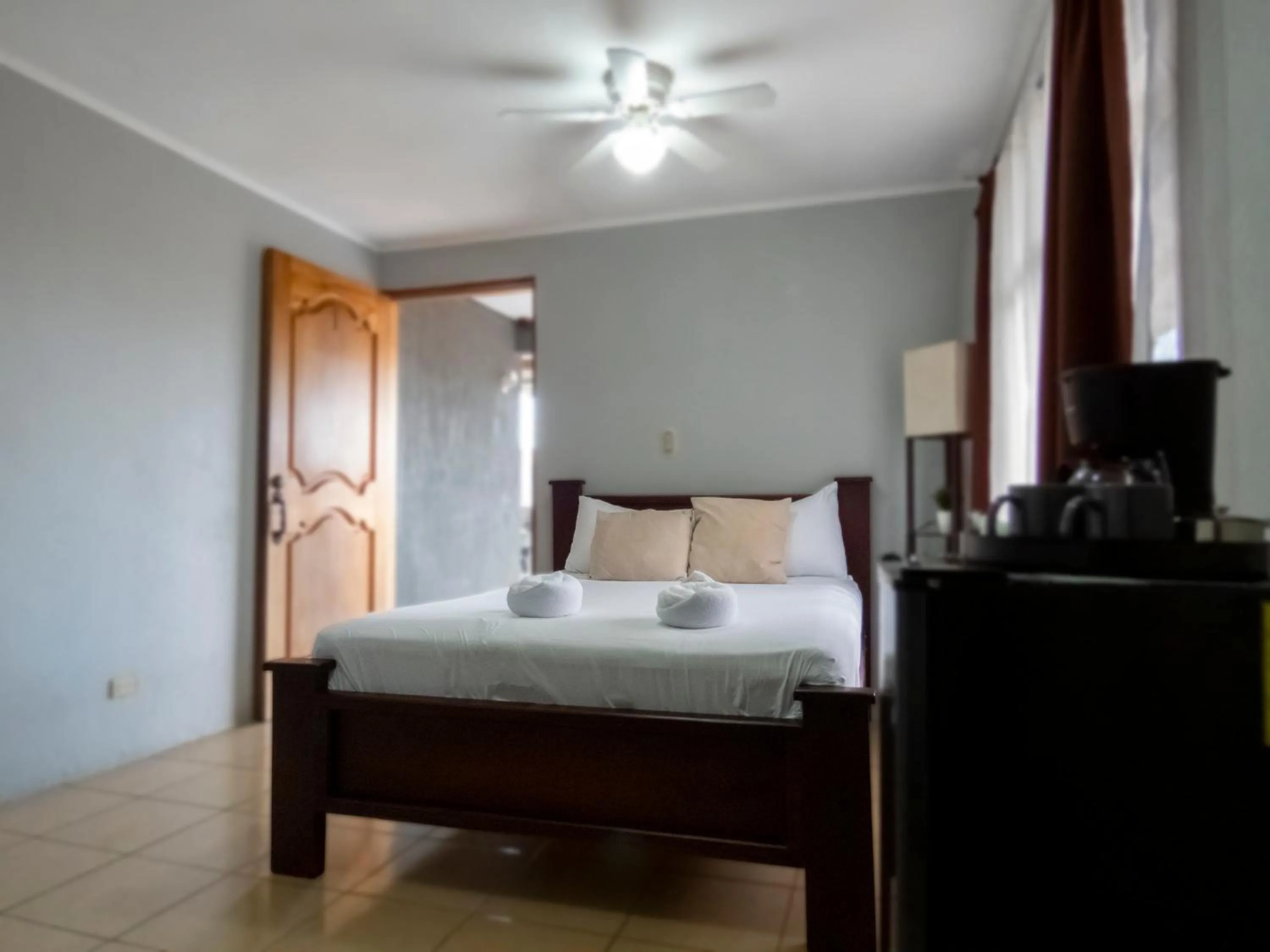 Bed in Coati Arenal Lodge