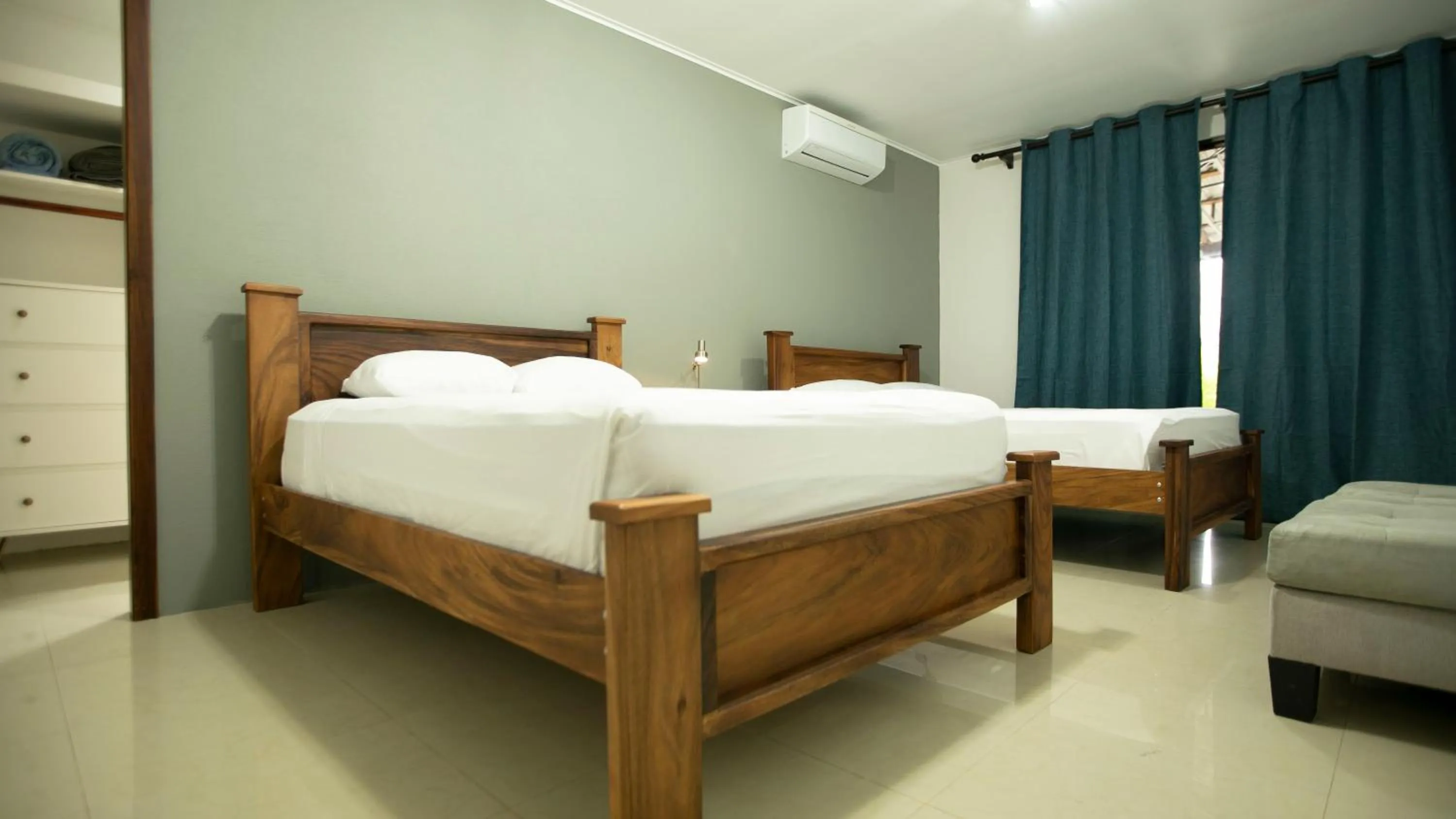 Bed in Coati Arenal Lodge