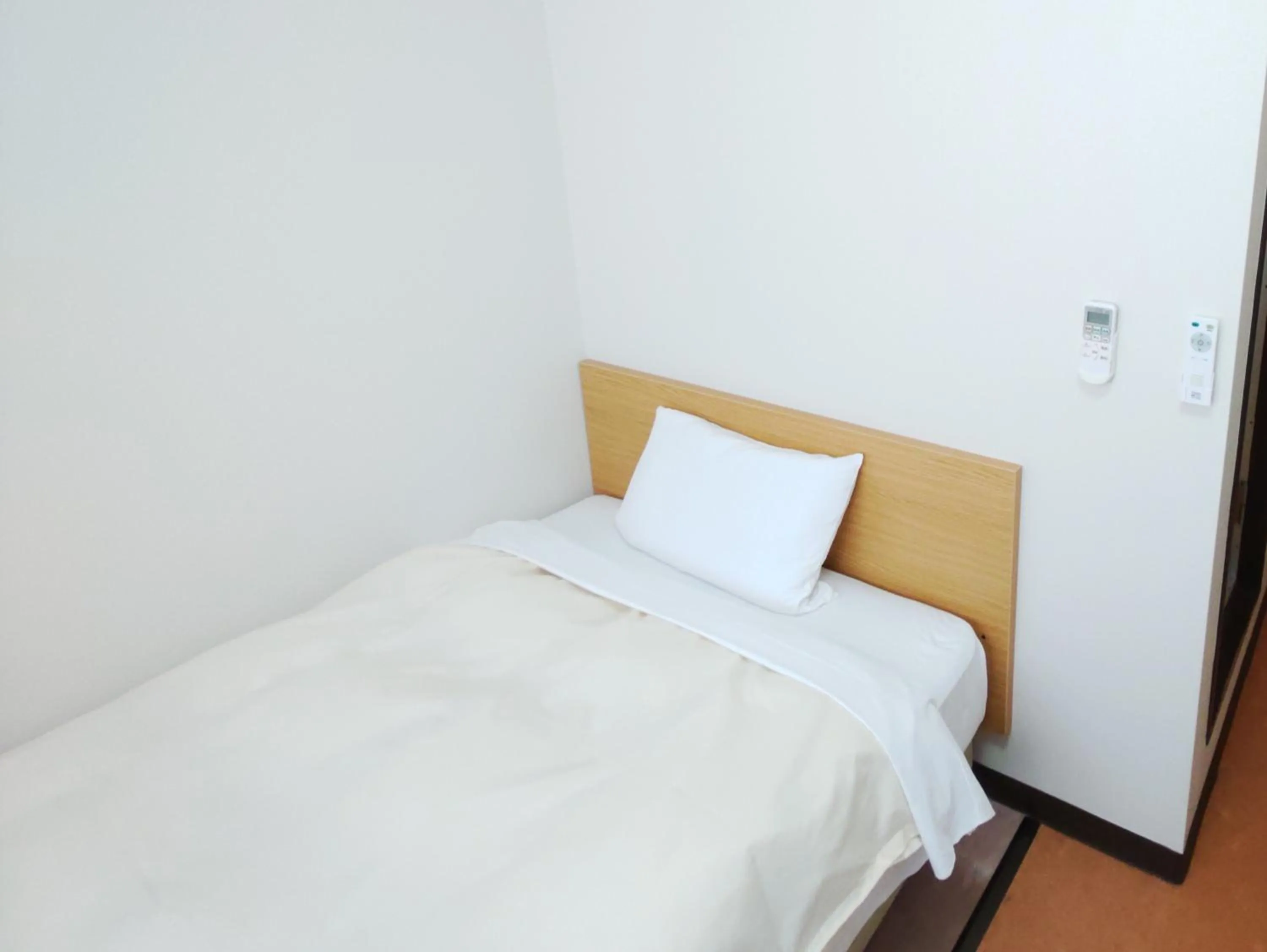 Bed in Hotel Hakusan Hills