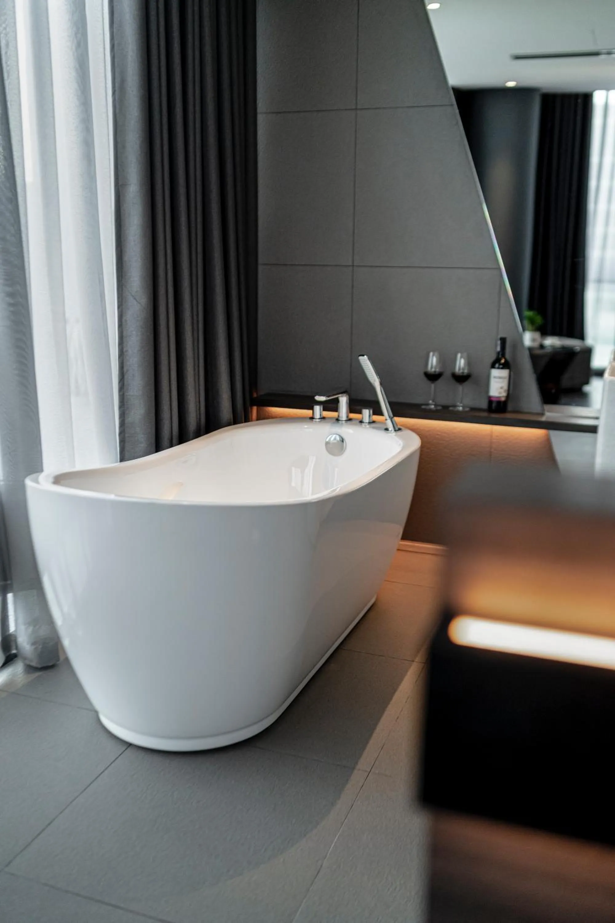 Bathroom in Draco Hotel & Suites