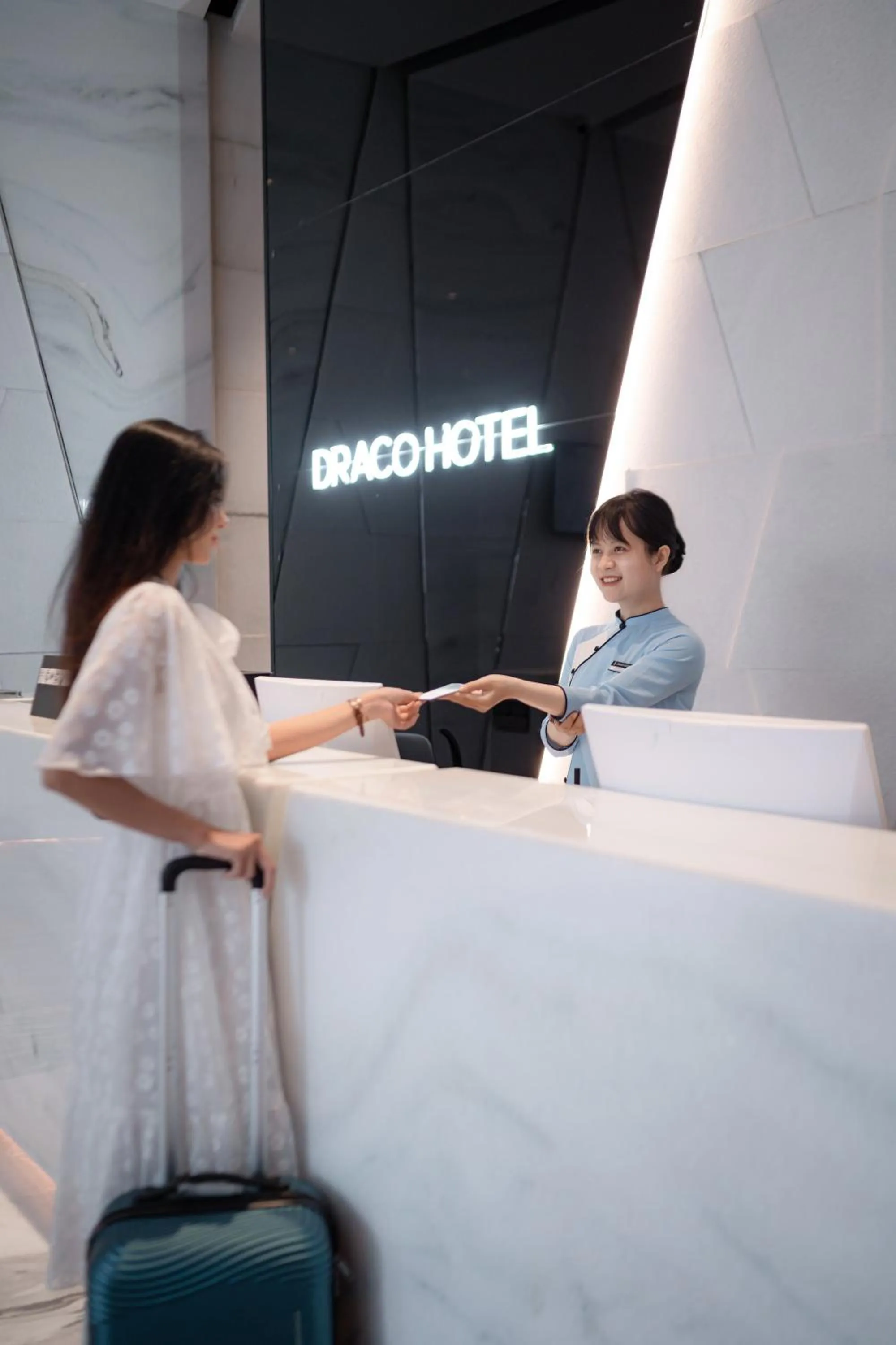 Staff in Draco Hotel & Suites