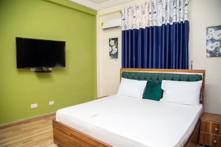 Bed in Macoba Luxury Apartments