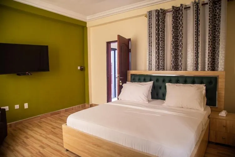 Bed in Macoba Luxury Apartments