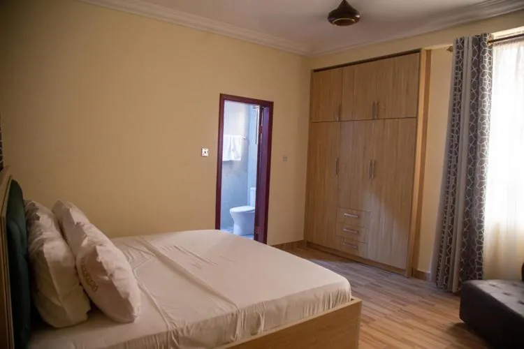 Bed in Macoba Luxury Apartments