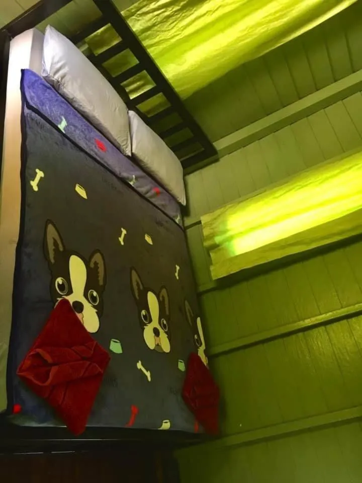 Bed in Green Garden Bungalows