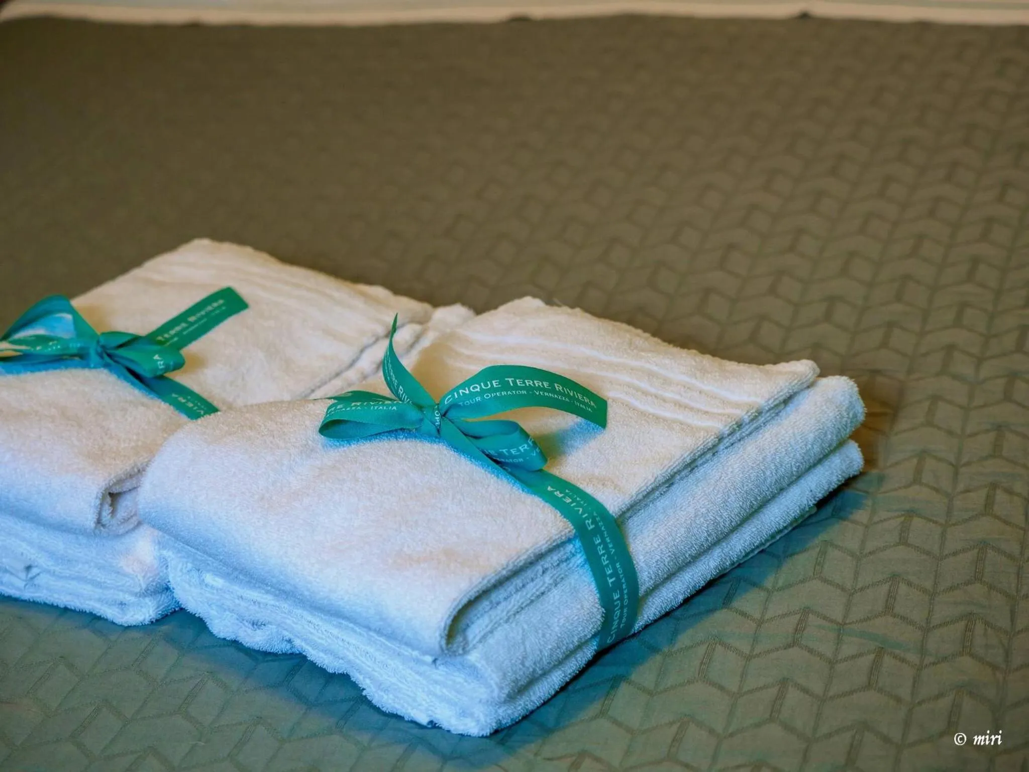 Bed in Carmelina Tiny Village Room