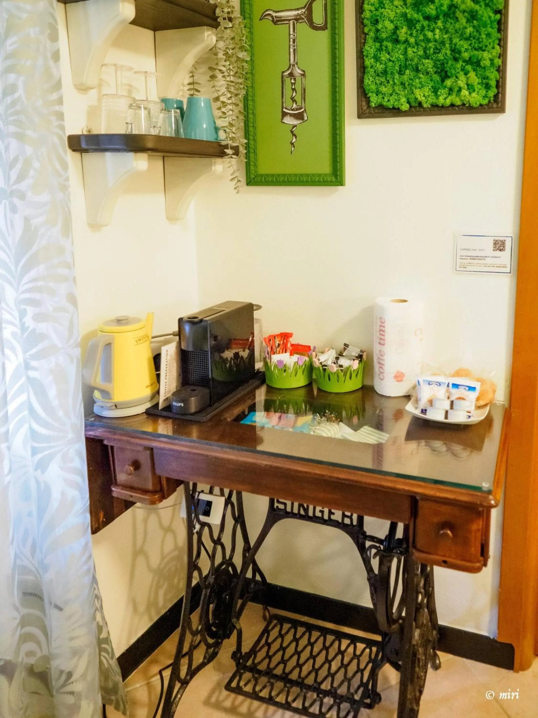 Bed in Carmelina Tiny Village Room