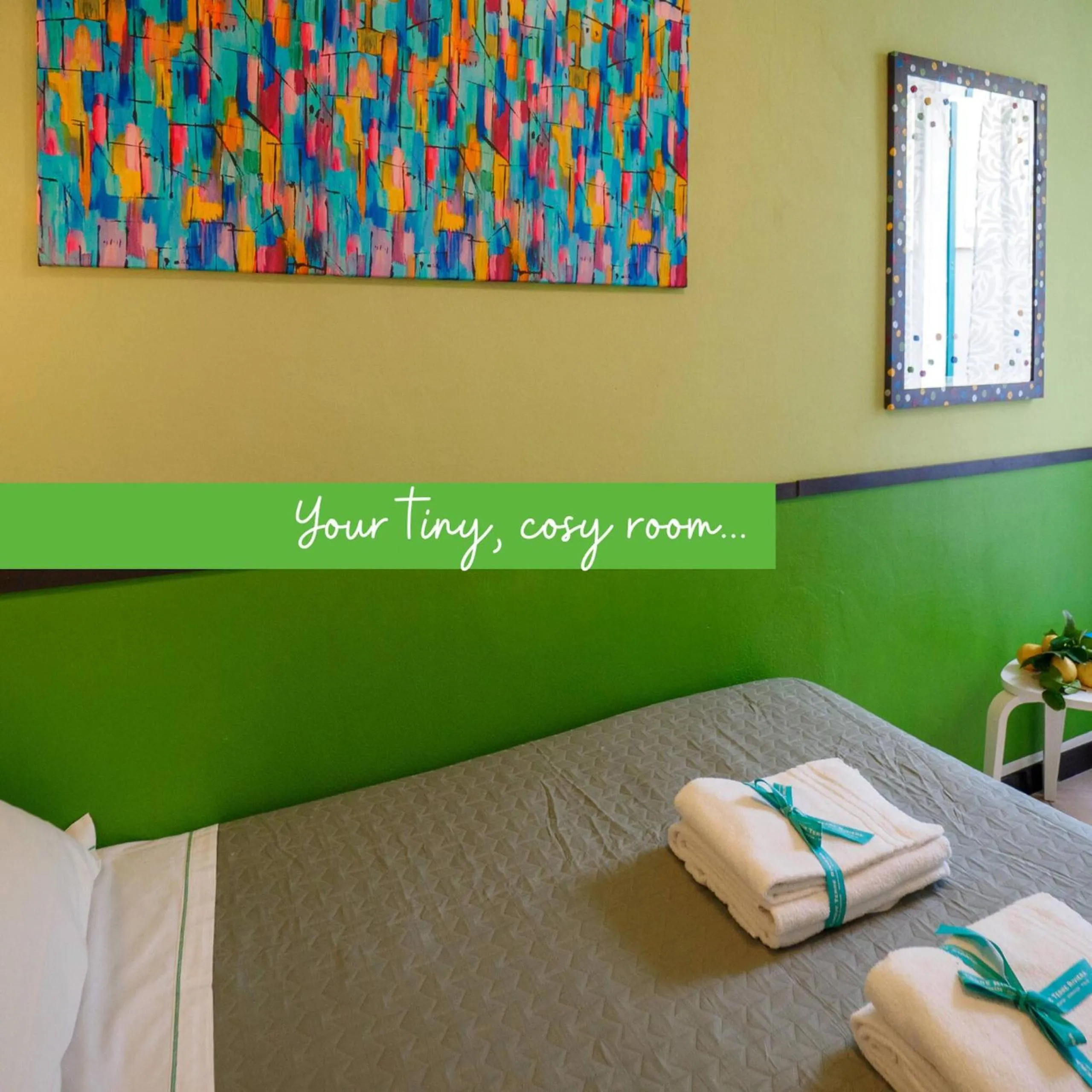 Bed in Carmelina Tiny Village Room